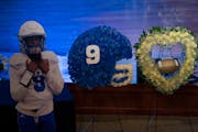 Flower arrangements next to the casket at the memorial service for Deshaun Hill Jr.,15, Tuesday afternoon, February 22, 2022 at the Frank J. Lindquist