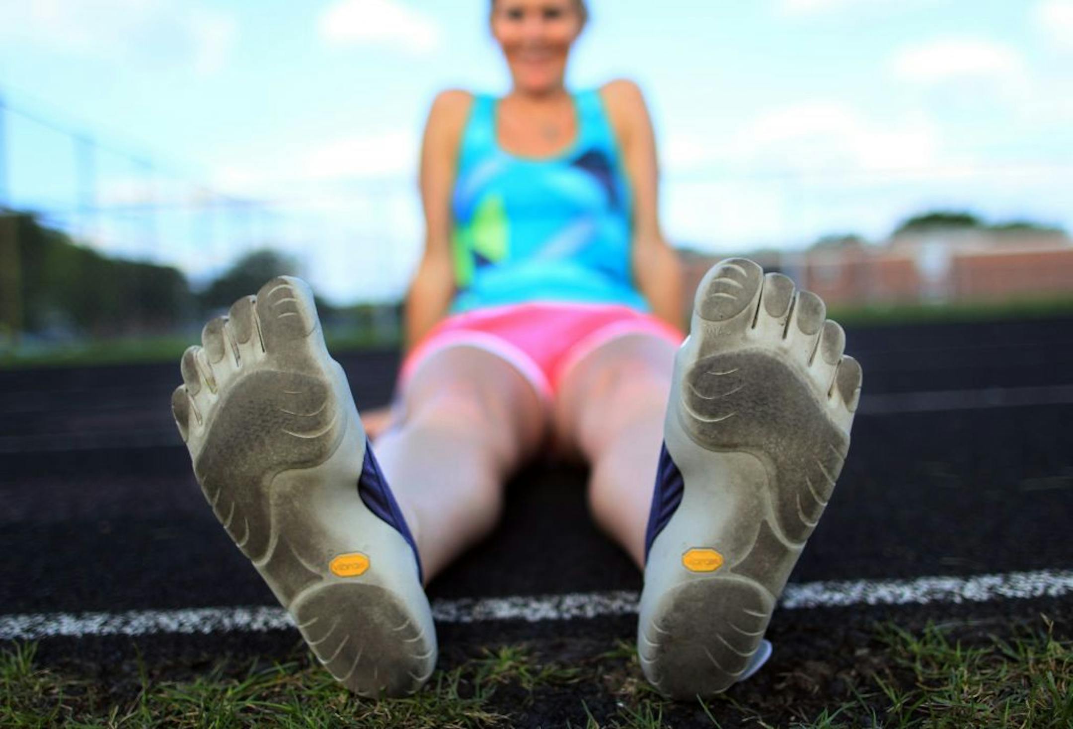 Shelly Noland is a proponent of the new barefoot-style of running. She wears Vibrams, which mimic running barefoot while protecting the soles of the feet.