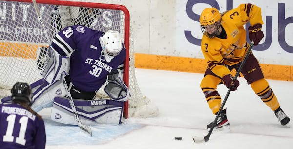 Gophers forward Catie Skaja looked to take a shot on St. Thomas goaltender Alexa Dobchuk during a game in January.