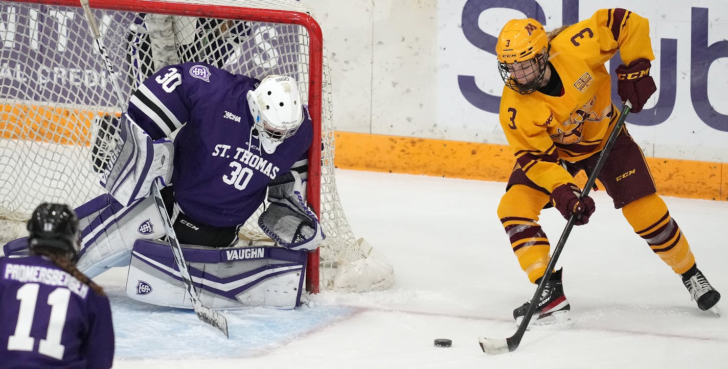 Gophers forward Catie Skaja looked to take a shot on St. Thomas goaltender Alexa Dobchuk during a game in January.