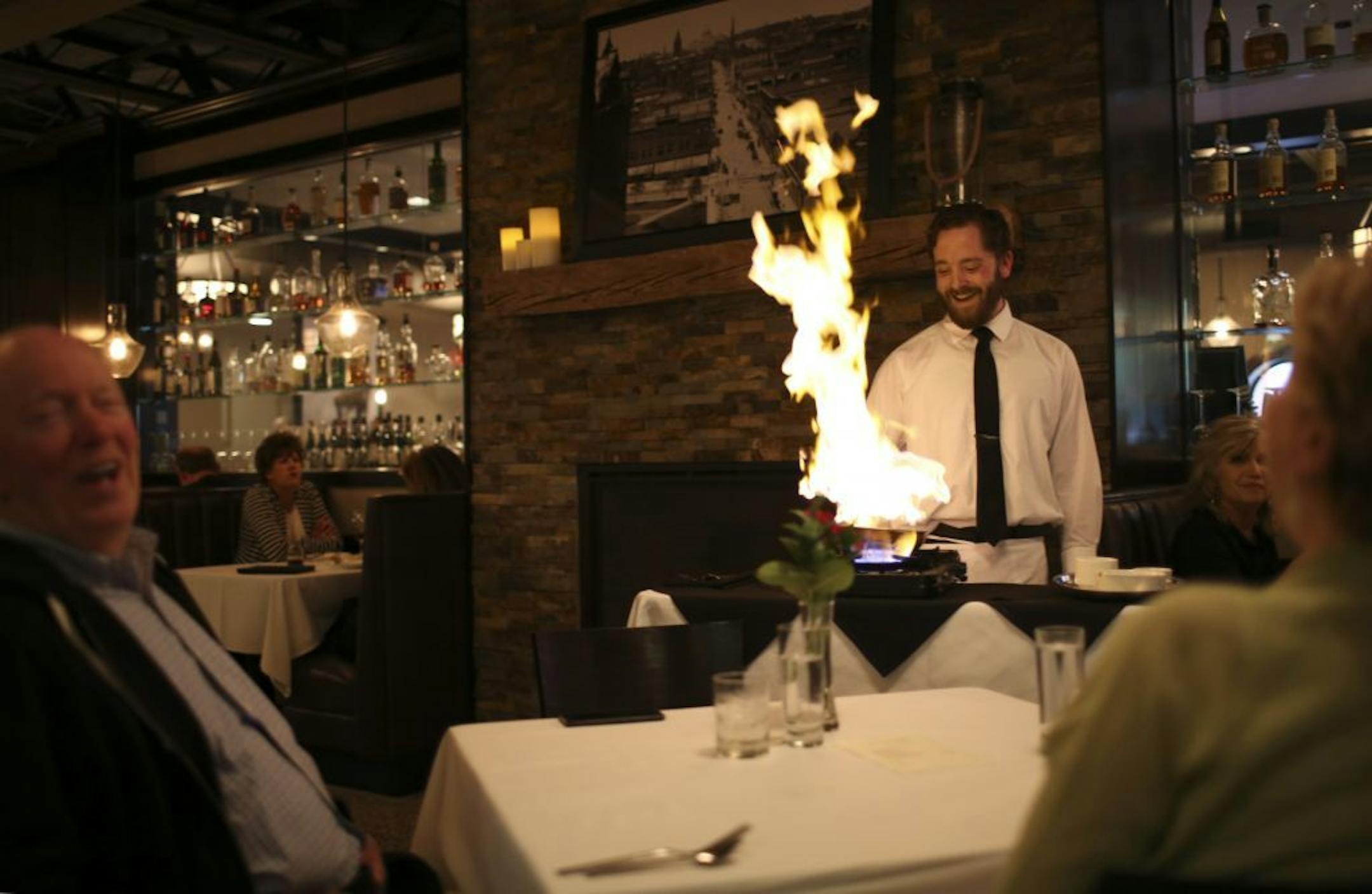 Mark Parranto prepared Bananas Foster table side for Jim Crockarell and Rosemary Kortgard at Salt Cellar Monday evening.