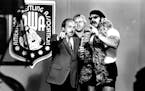 Gene Okerlund jousted with pro wrestler Jesse "the Body" Ventura, right, and Ventura's manager, Bobby "the Brain" Heenan, in 1982 on an American Wrest