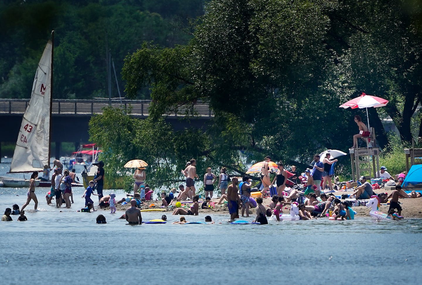 Swimmers flocked to Lake Nokomis Beach in Minneapolis to deal with the extreme heat in July 2021.