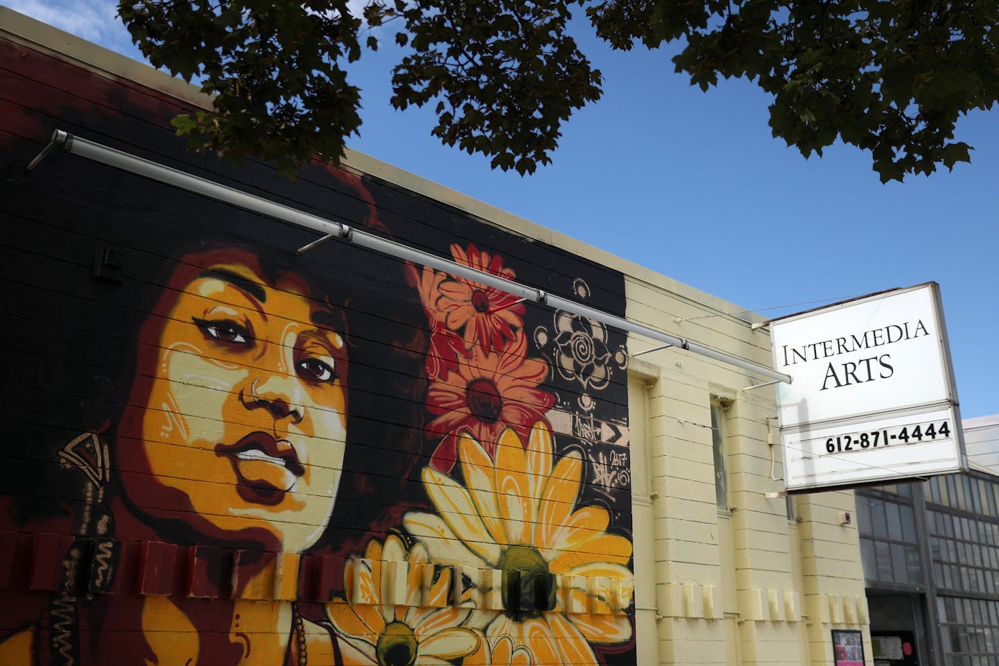 Murals adorned the outside of the Intermedia Arts building Thursday. ] ANTHONY SOUFFLE &#xef; anthony.souffle@startribune.com Intermedia Arts, the Minneapolis theater and gallery space that has long been a mainstay of the arts community, is freezing operations temporarily as it confronts a financial crisis. The venue will reduce its staff by 80 percent and operate on a skeletal basis over the next 90 days. In that time, Intermedia will consider its options, including selling its home in the now