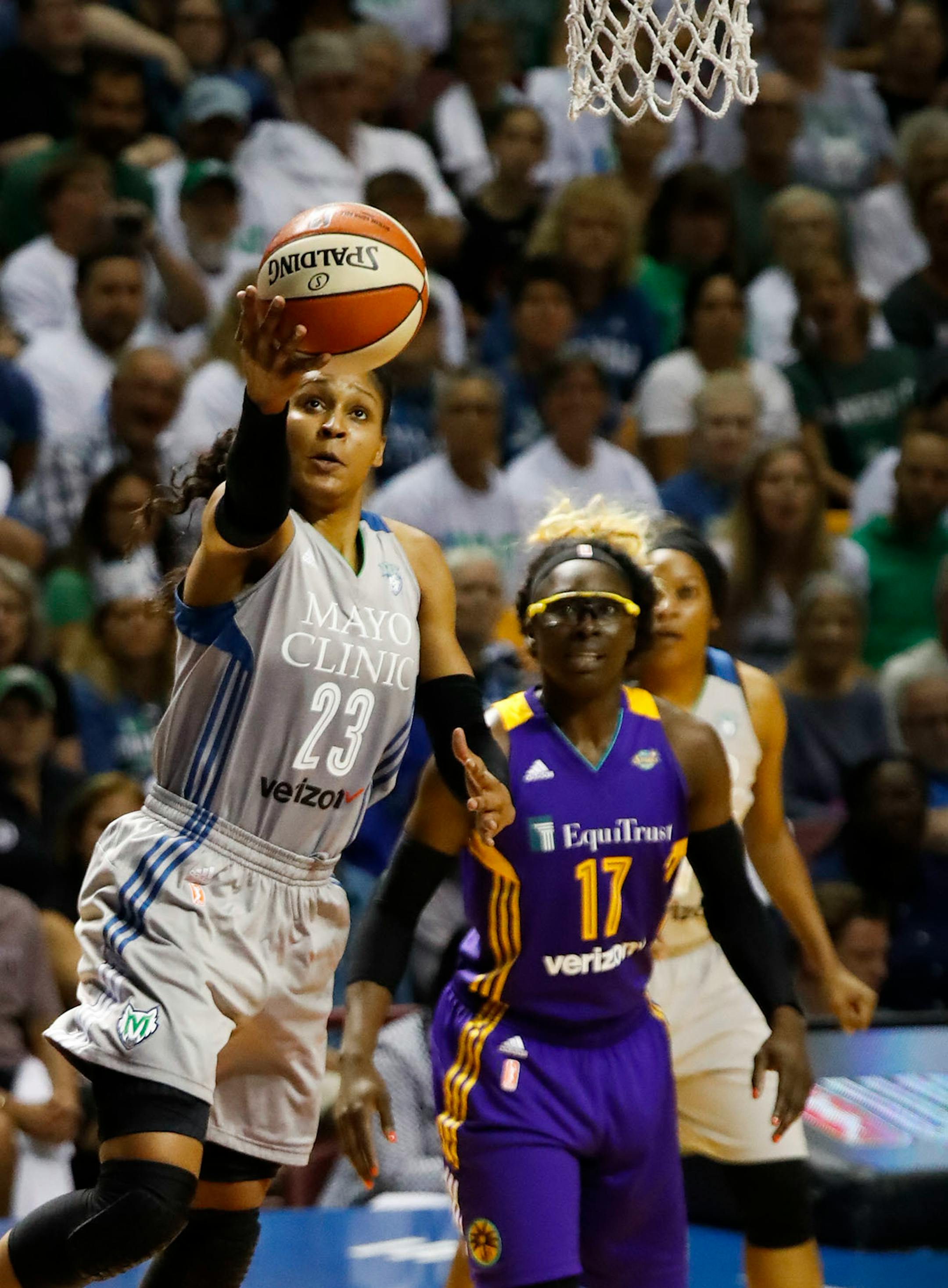 Minnesota Lynx forward Maya Moore (23) went for a shot during the first half.