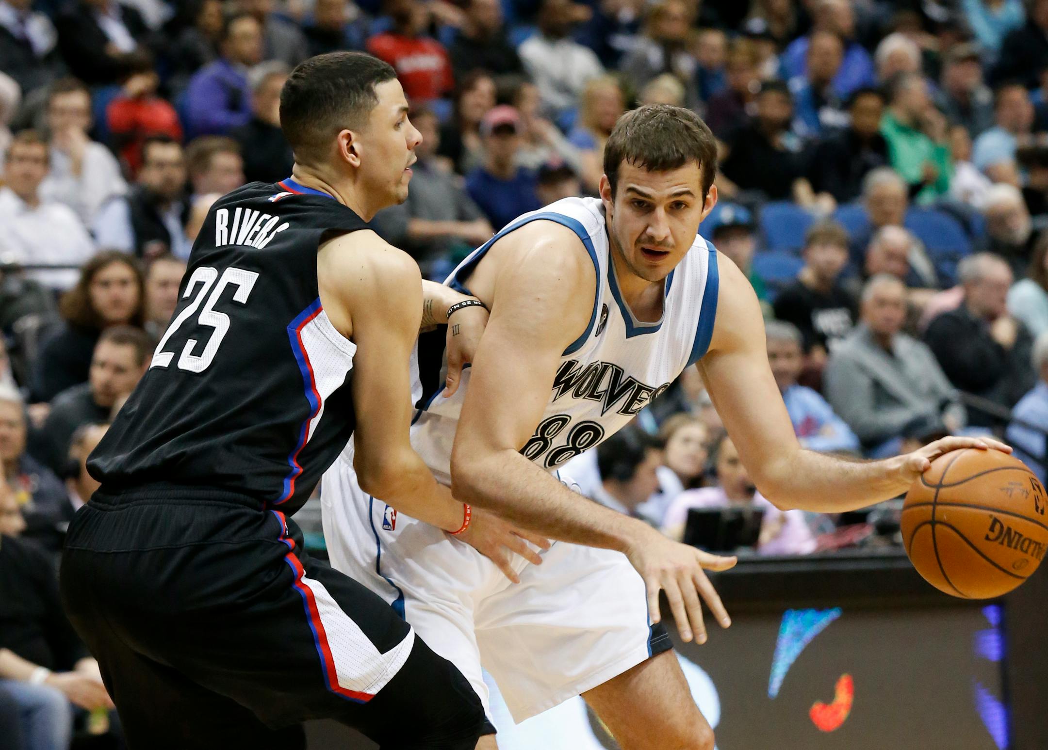 The Serbian basketball federation reportedly has said Timberwolves forward Nemanja Bjelica, right, will miss the Rio Olympics because of a right foot injury.