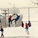 January 25, 1990 What's cold, white and in Red Wing? Kids played on snow banks that brought the basketball hoop within reach during lunch hour Wednesd