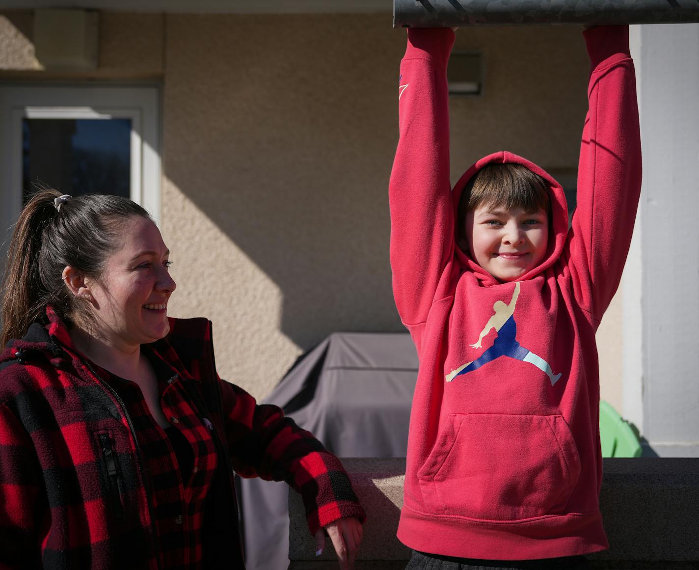 Angele Enger and her son Landyn are photographed at their home in St. Paul, Minn., on Thursday, April 6, 2023.