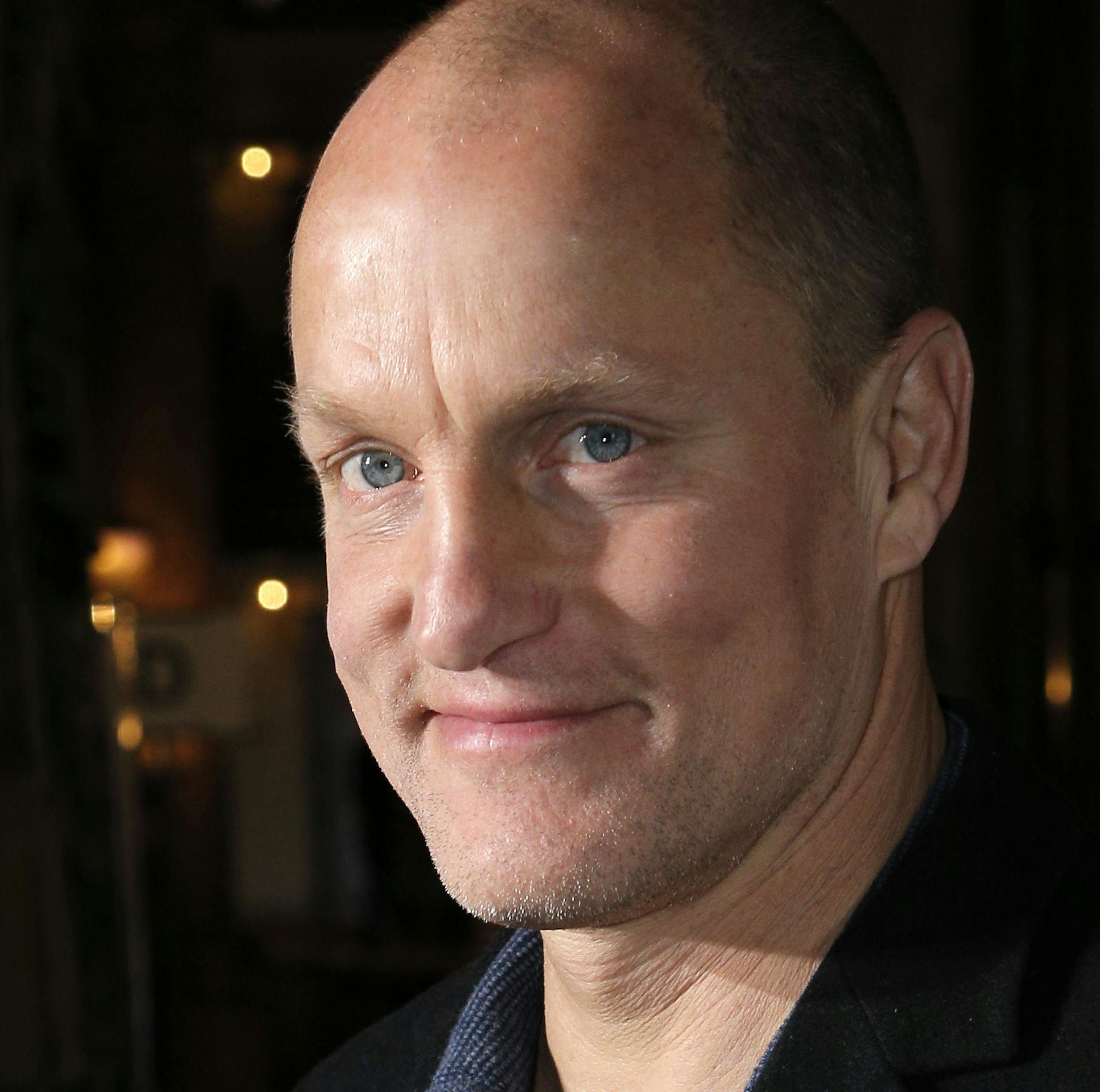 Actor Woody Harrelson poses for photographers prior to Stella McCartney's ready to wear fall-winter 2015-2016 fashion collection during Paris Fashion Week, Paris, France, Monday, March 9, 2015. (AP Photo/Thibault Camus)