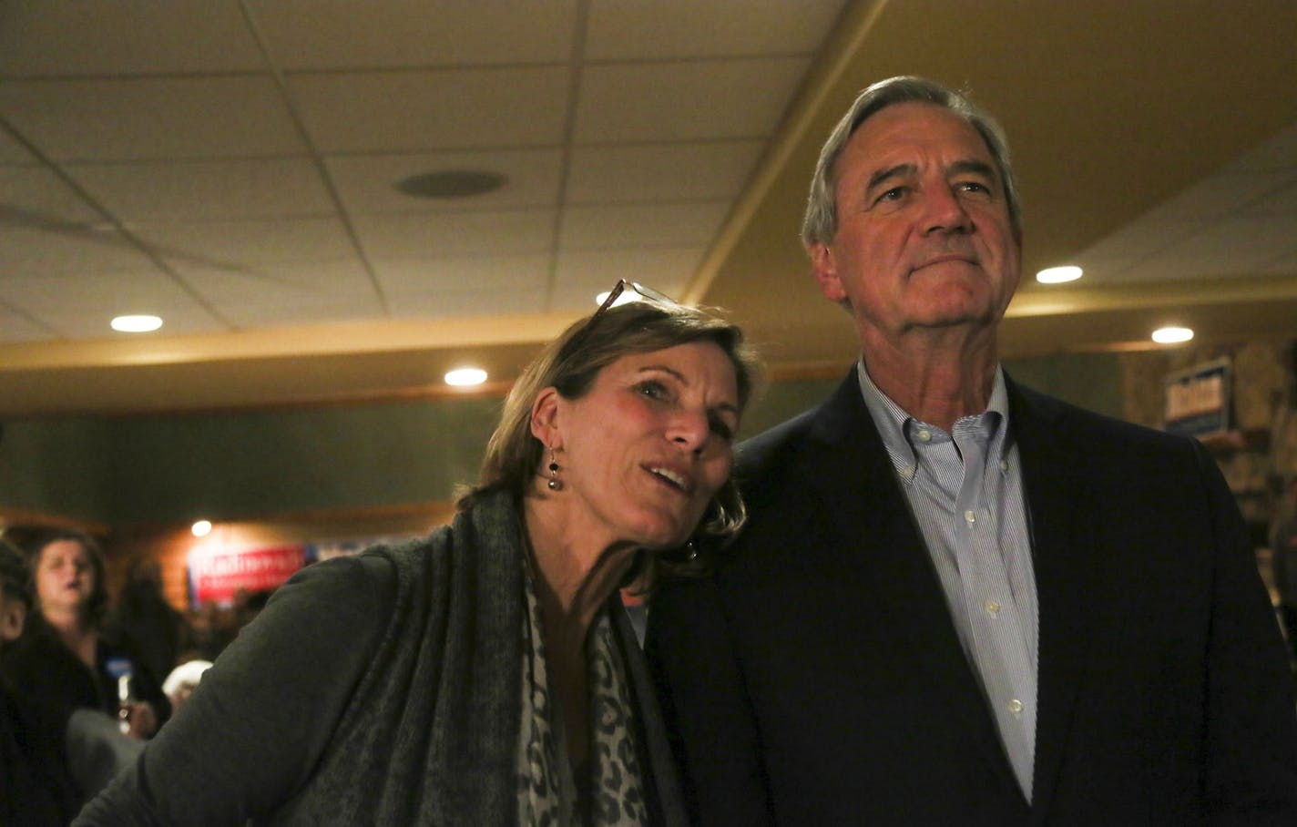 Democrat U.S. Rep. Rick Nolan with his wife Mary monitor the early election results showing Nolan in the lead at his elections headquarters at the Arrowwood LodgeTuesday, Nov. 4, 2014, in Baxter, MN. Nolan is running against Republican Stuart Mills in the 8th congressional race.