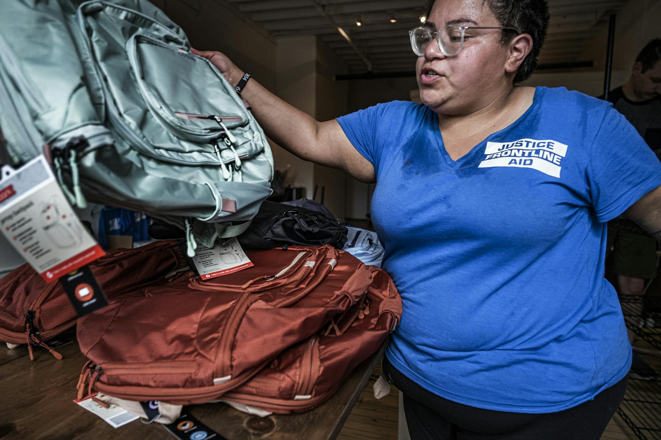 Deshann Sanchez who founded Justice Frontline Aid got some backpacks ready as she prepares to head out to Kenosha, Wisconsin to join the protests there. The backpacks donated or purchased with donations will be used for first aid kits.