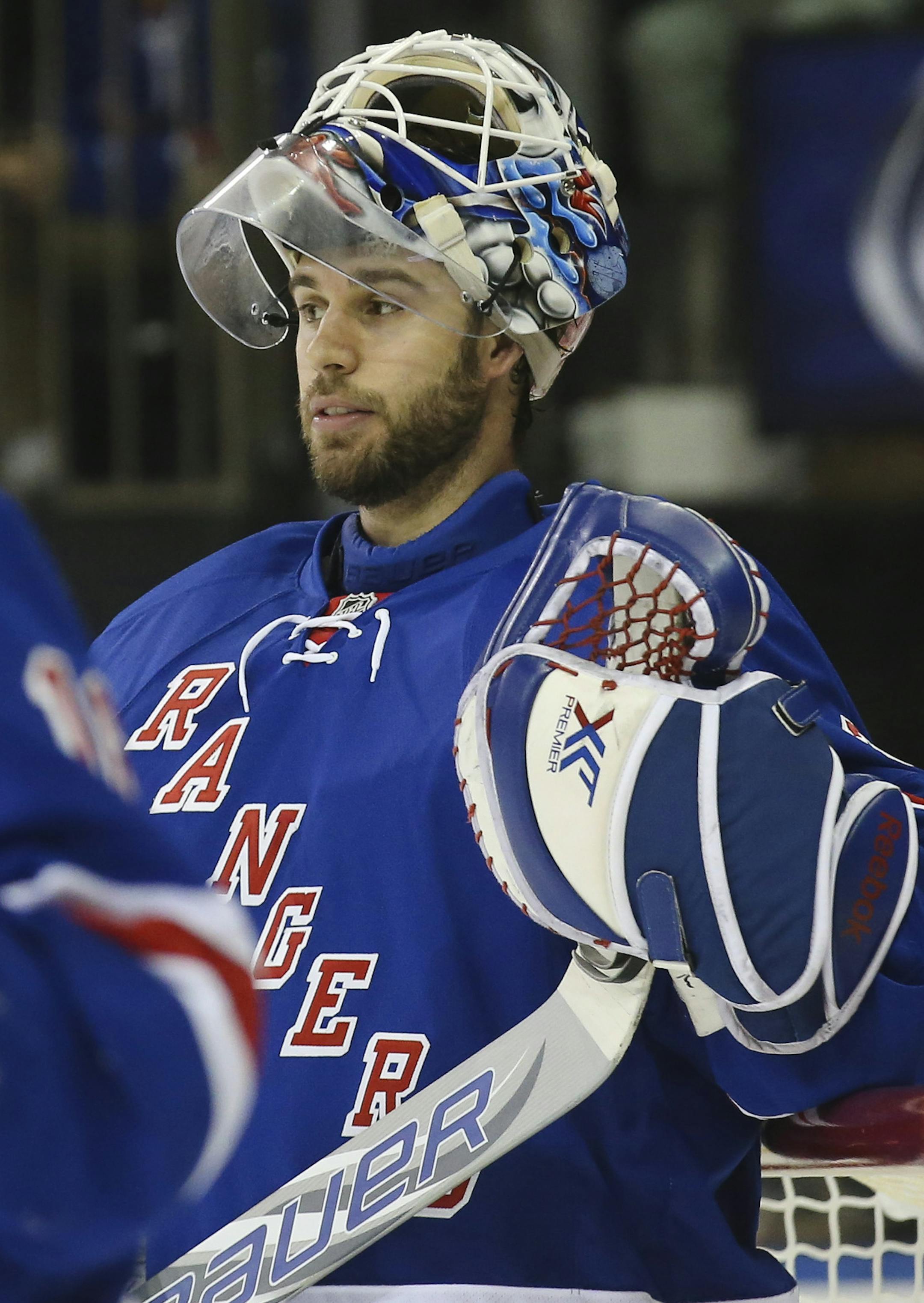 New York Rangers goalie Cam Talbot (33) stands in goal in the first period of an NHL hockey game against the Carolina Hurricanes, Sunday, Dec. 21, 2014, in New York. The Rangers won 1-0. (AP Photo/John Minchillo) ORG XMIT: NYJMOTK
