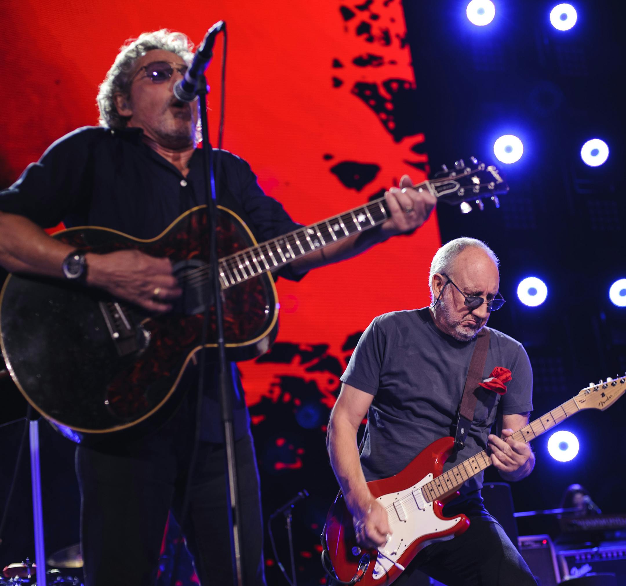 Roger Daltrey, left, and Pete Townshend, right, of The Who, playing on their tour, &#xec;The Who Hits 50!,&#xee; at Nassau Coliseum in Uniondale, N.Y., May 20, 2015. (Jacob Blickenstaff/The New York Times)