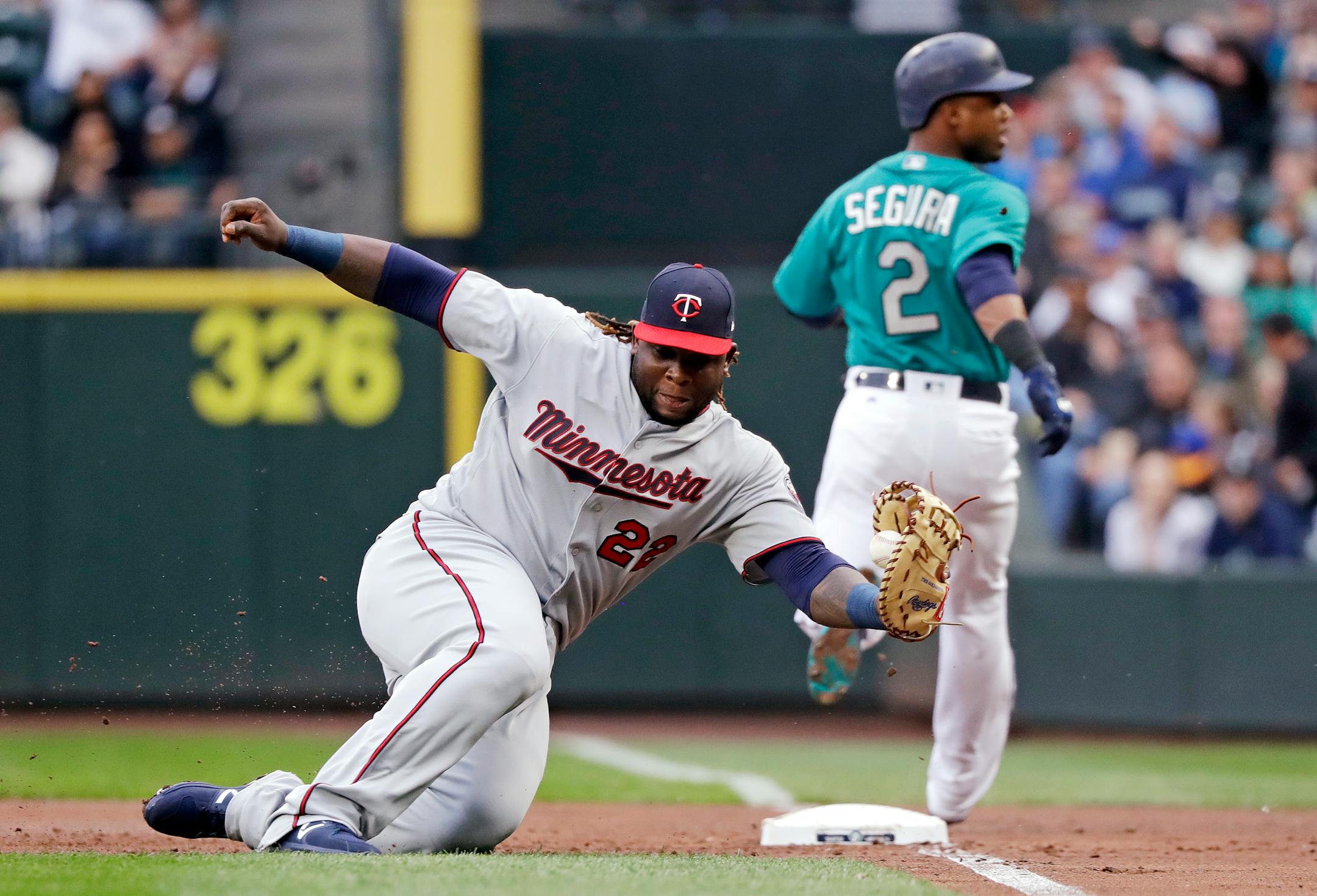 Miguel Sano was back in uniform Friday, but at first base instead of third base.