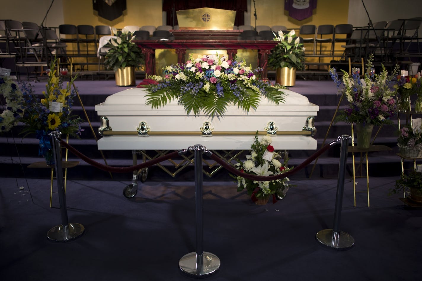 Barway Collins' casket is seen before the start of his funeral Saturday.