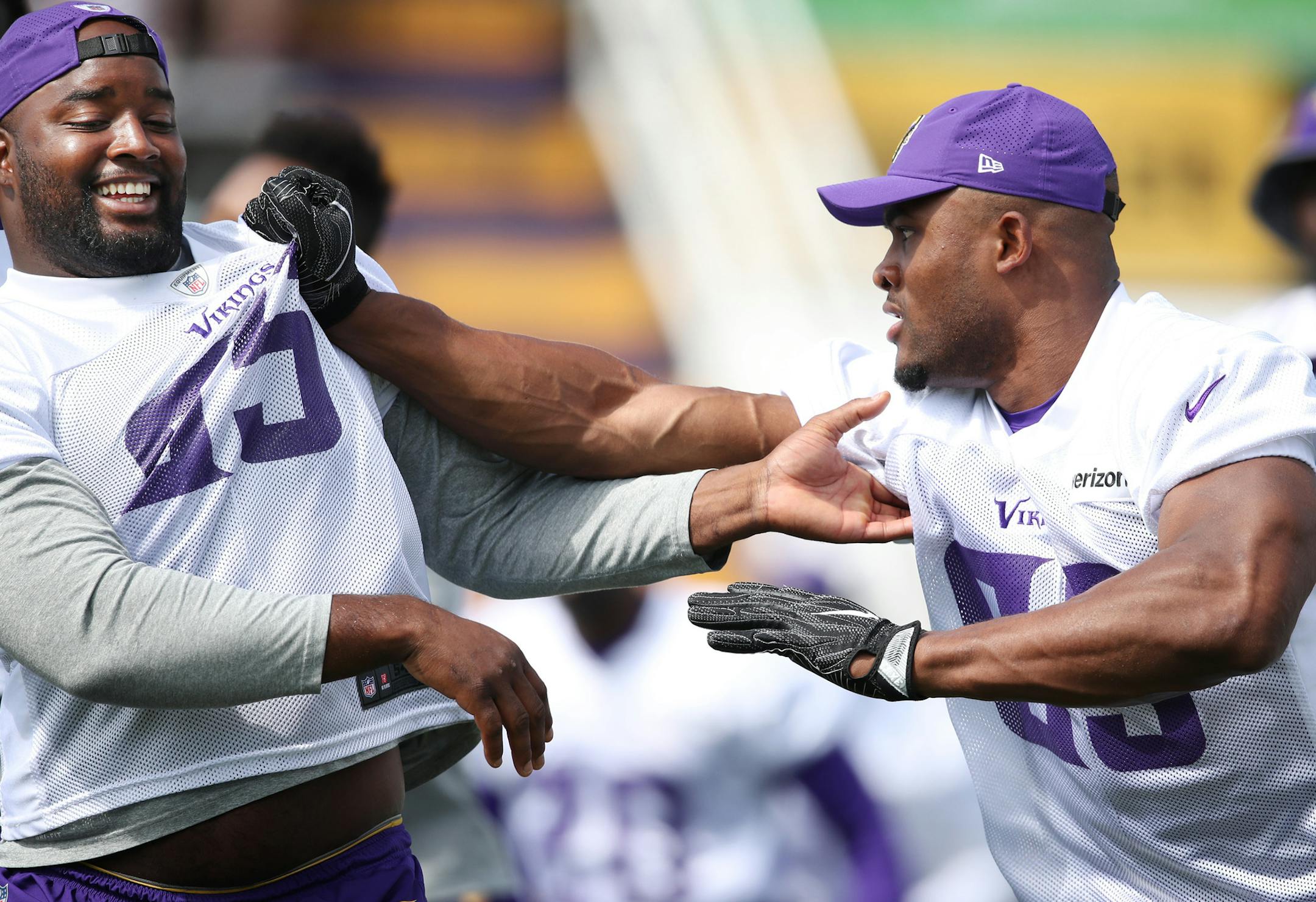 Free-agent acquisition Datone Jones, left, got a taste of new Vikings teammate Danielle Hunter as they worked on line drills in Mankato on July 28. Hunter has blossomed into a standout pass rusher in his first two seasons as a professional.