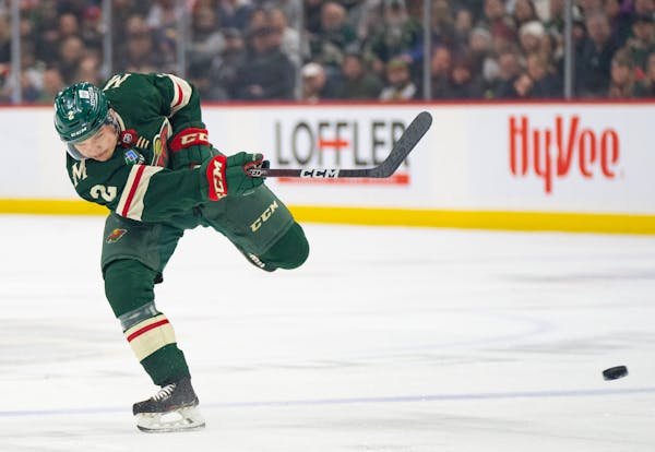 Wild defenseman Calen Addison took a shot against the Devils on Saturday at Xcel Energy Center. He was a healthy scratch Wednesday against Colorado at