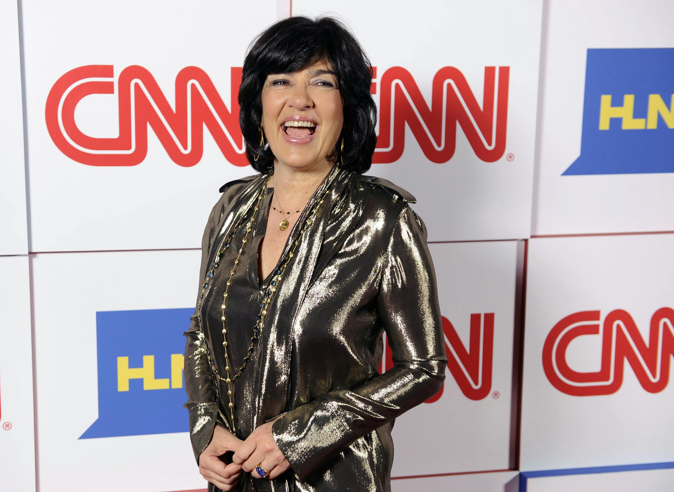 FILE - In this Jan. 10, 2014, file photo, Christiane Amanpour of CNN reacts to photographers at the CNN Worldwide All-Star Party in Pasadena, Calif. Amanpour is helping PBS fill the gap created by Charlie Rose's exit. On an interim basis, public TV stations will be able to air Amanpour's weekday public affairs program that originates on CNN International. (Photo by Chris Pizzello/Invision/AP, File)
