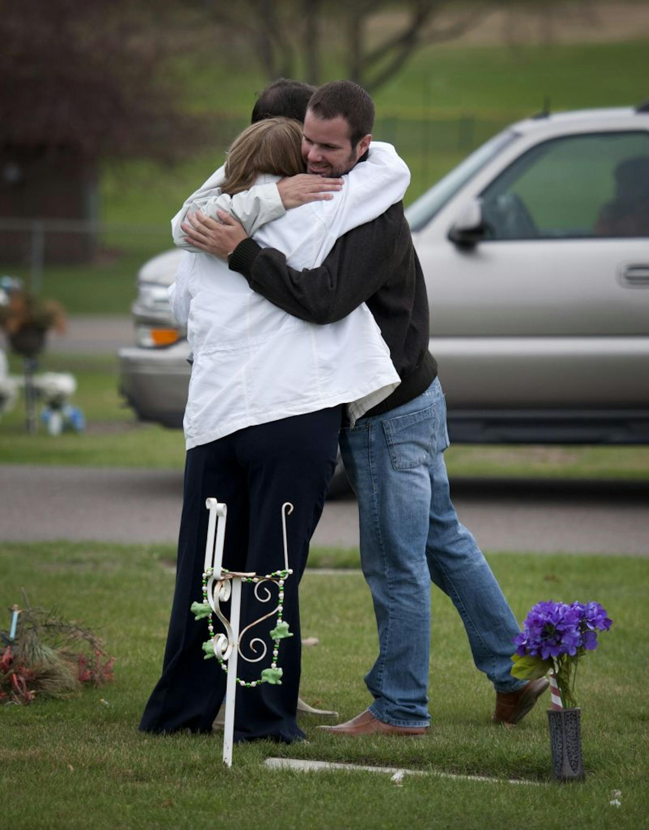Denise and Dave Shannon hugged each other and their son, Brandon, on Wednesday after they went to Bridgette Shannon's grave to "tell her the news" of the Minnesota Supreme Court verdict and to deliver froggy beads that reminded Dave and Brandon of Bridgette, whose nickname was Ribbit .