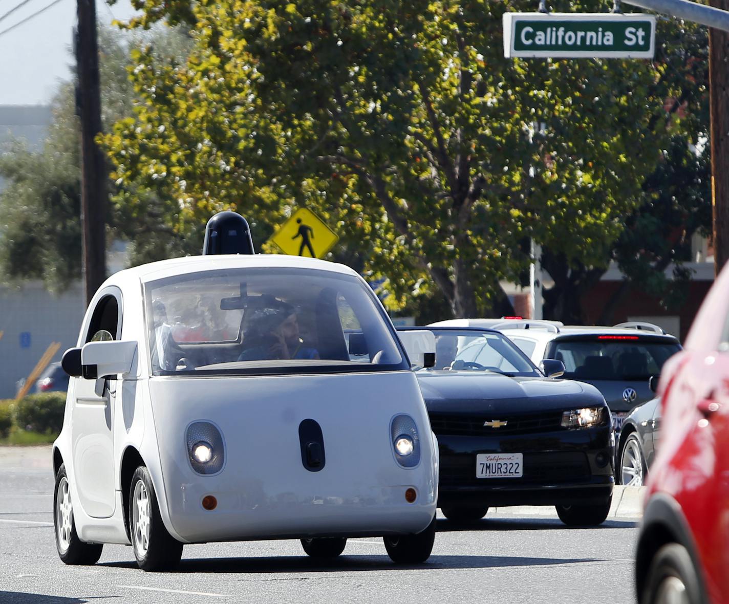 A Google self-driving car travels eastbound on San Antonio Road in Mountain View, Calif., on Wednesday, Oct. 22, 2015. (Karl Mondon/Bay Area News Group/TNS) ORG XMIT: 1175768