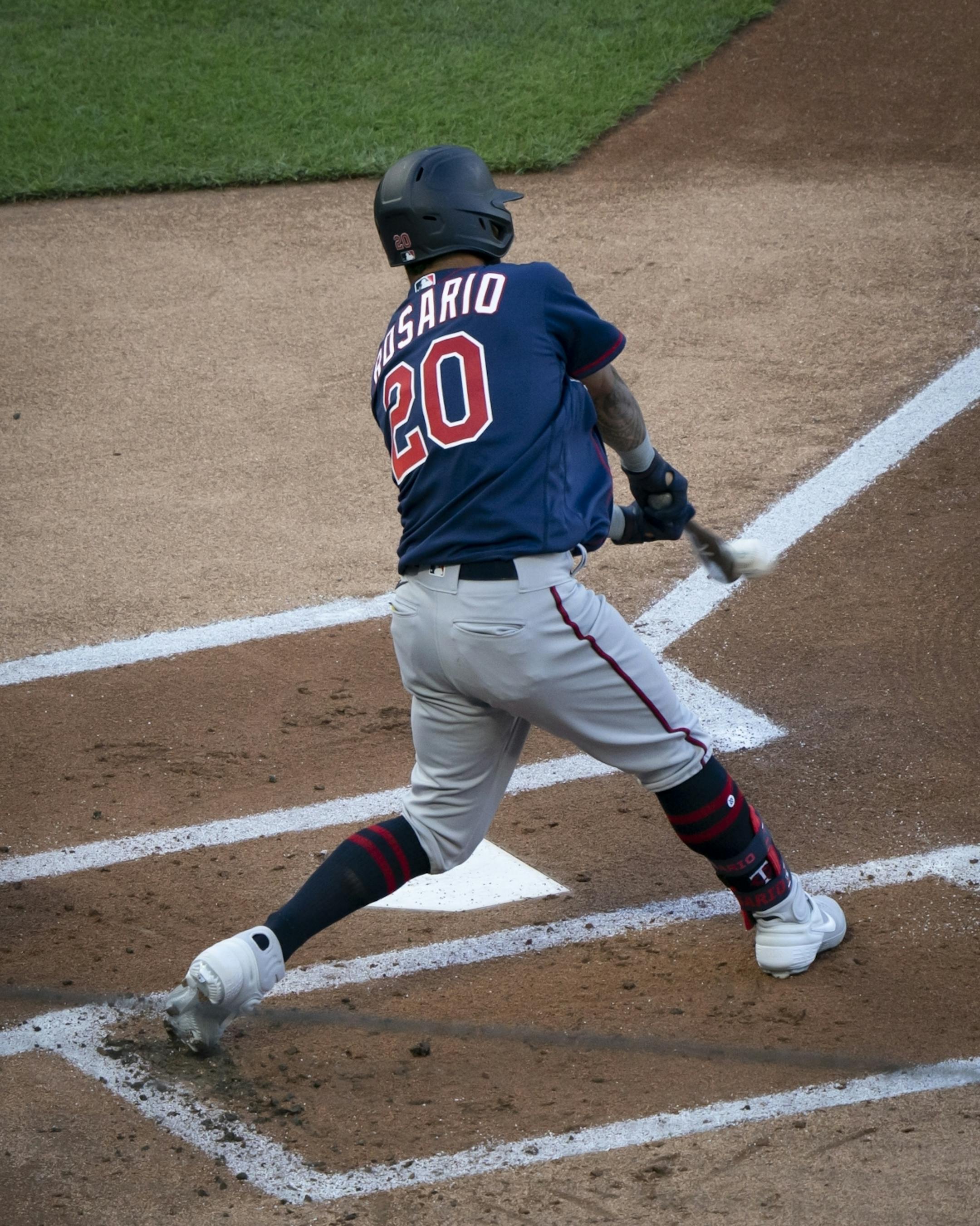 Minnesota Twins right fielder Eddie Rosario (20) got a hit the first inning during a scrimmage at practice at Target Field in Minneapolis, Minn., on Wednesday, July 15, 2020.