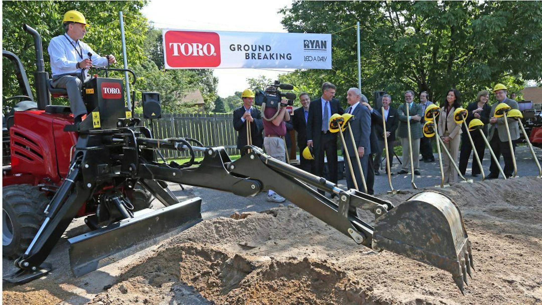Sept. 5, 2013: Toro company CEO Mike Hoffman ran a tractor after he, Gov. Mark Dayton, Rep. Erik Paulsen, Bloomington Mayor Gene Winstead and Pat Ryan of Ryan Construction tossed dirt during the groundbreaking for a new Toro headquarters expansion in Bloomington.