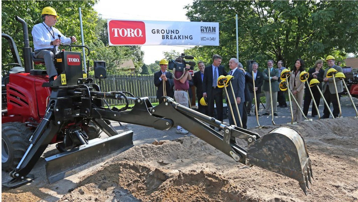 Sept. 5, 2013: Toro company CEO Mike Hoffman ran a tractor after he, Gov. Mark Dayton, Rep. Erik Paulsen, Bloomington Mayor Gene Winstead and Pat Ryan of Ryan Construction tossed dirt during the groundbreaking for a new Toro headquarters expansion in Bloomington.