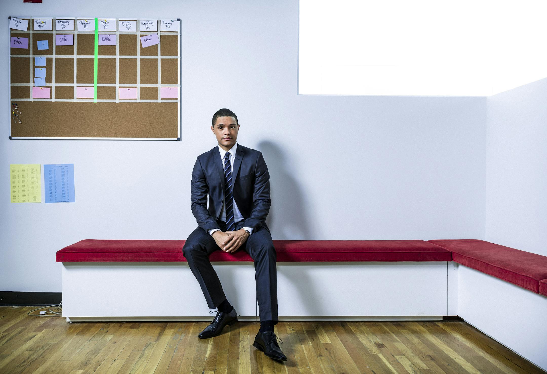 PHOTO MOVED IN ADVANCE AND NOT FOR USE - ONLINE OR IN PRINT - BEFORE SEPT. 27, 2015. -- Trevor Noah, who is replacing Jon Stewart as host of "The Daily Show," at the series' offices in New York, Sept. 16, 2015. Noah, who was born and raised in apartheid-era South Africa by a black mother and a white father, built an international reputation as a standup comedian before the handful of “Daily Show” appearances that preceded the surprising announcement that Comedy Central had chosen h