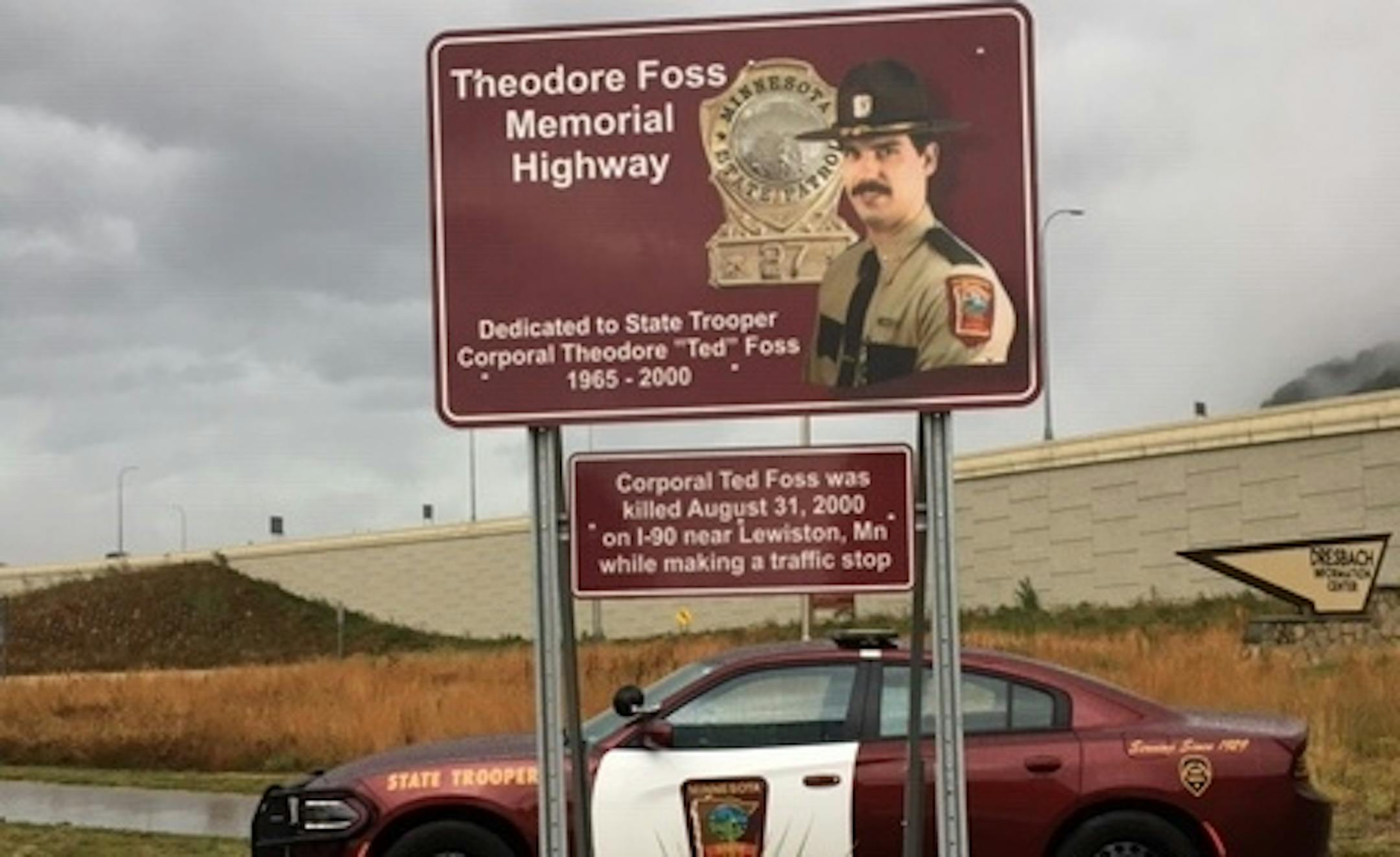 New signs honoring State Trooper Cpl. Theodore "Ted" Foss were installed Monday, Aug. 31, at the Dresbach Rest Area on I-90 south of Winona.