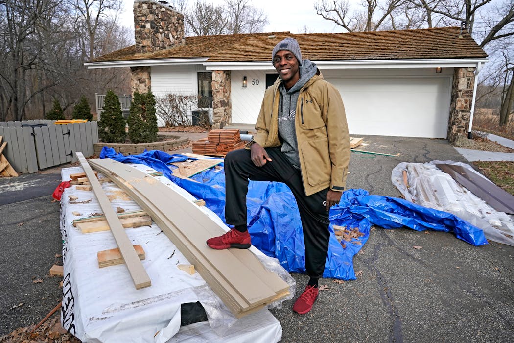 Anthony Tolliver has many side businesses, including flipping houses like this one in Orono.