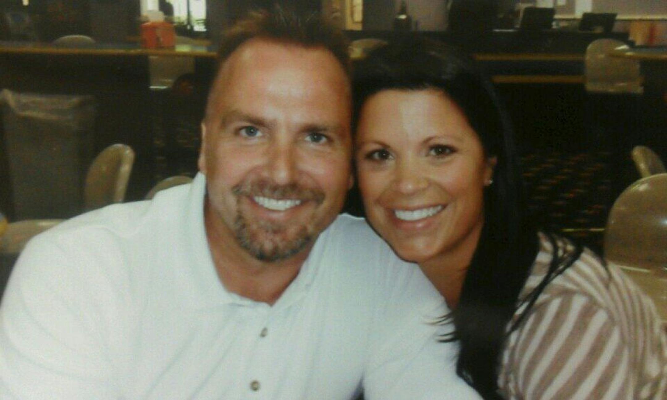 This undated photo provided by Mike Archambault shows Brian Vander Lee, 43, of Ramsey, left, and his wife, Kourtney Vander Lee. Brian Vander Lee is hospitalized after he was allegedly punched by an off-duty Minneapolis police sergeant and SWAT officer on Saturday night. Minneapolis police Sgt. David Clifford was charged with third-degree assault and was released Tuesday after posting $15,000 bail.