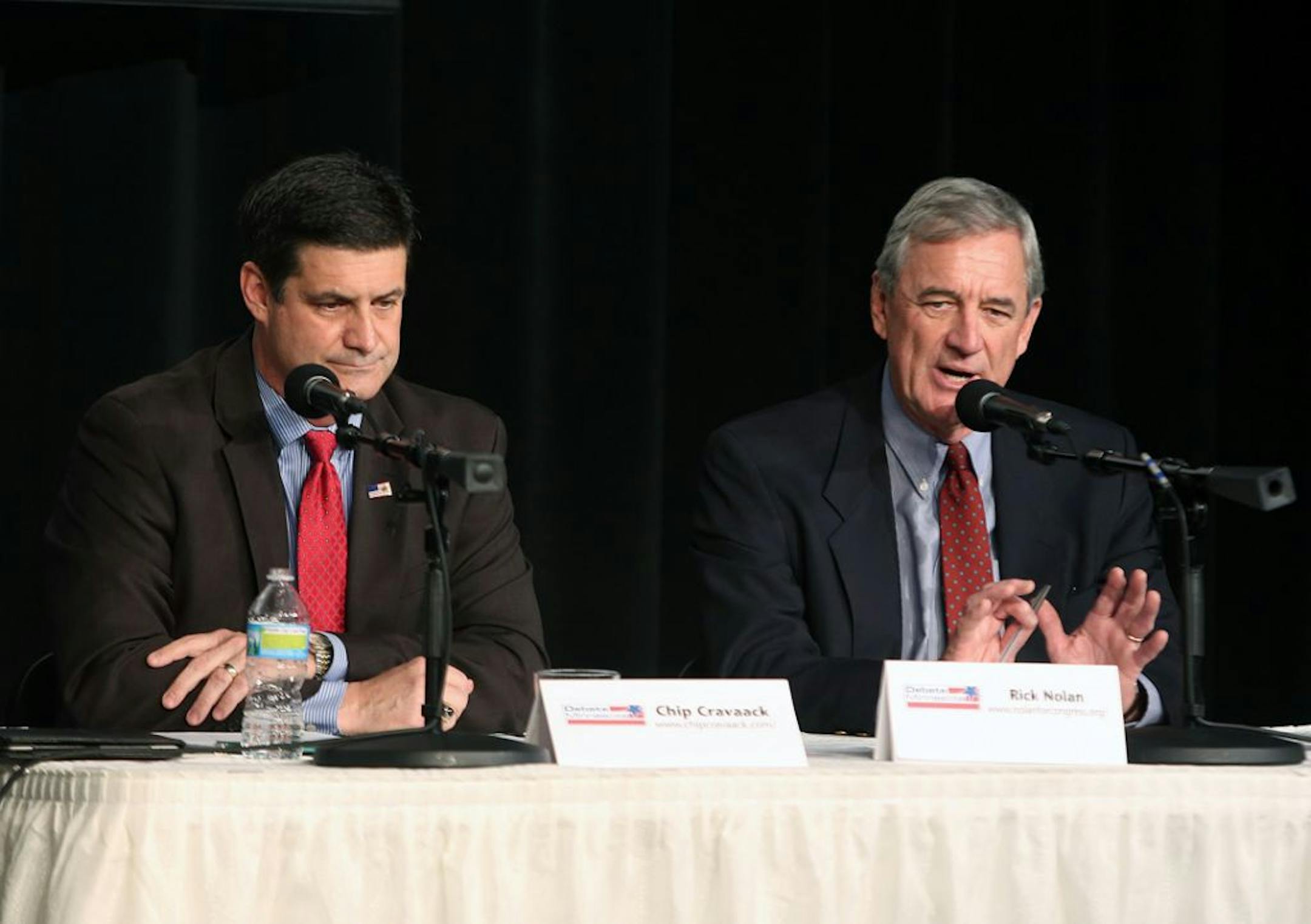 Republican U.S. Rep. Chip Cravaack, left, and Democrat Rick Nolan, a former congressman, used nearly every question during a debate Tuesday to take a jab at their opponent. The debate was held on the Cambridge, Minn., campus of Anoka-Ramsey Community College .