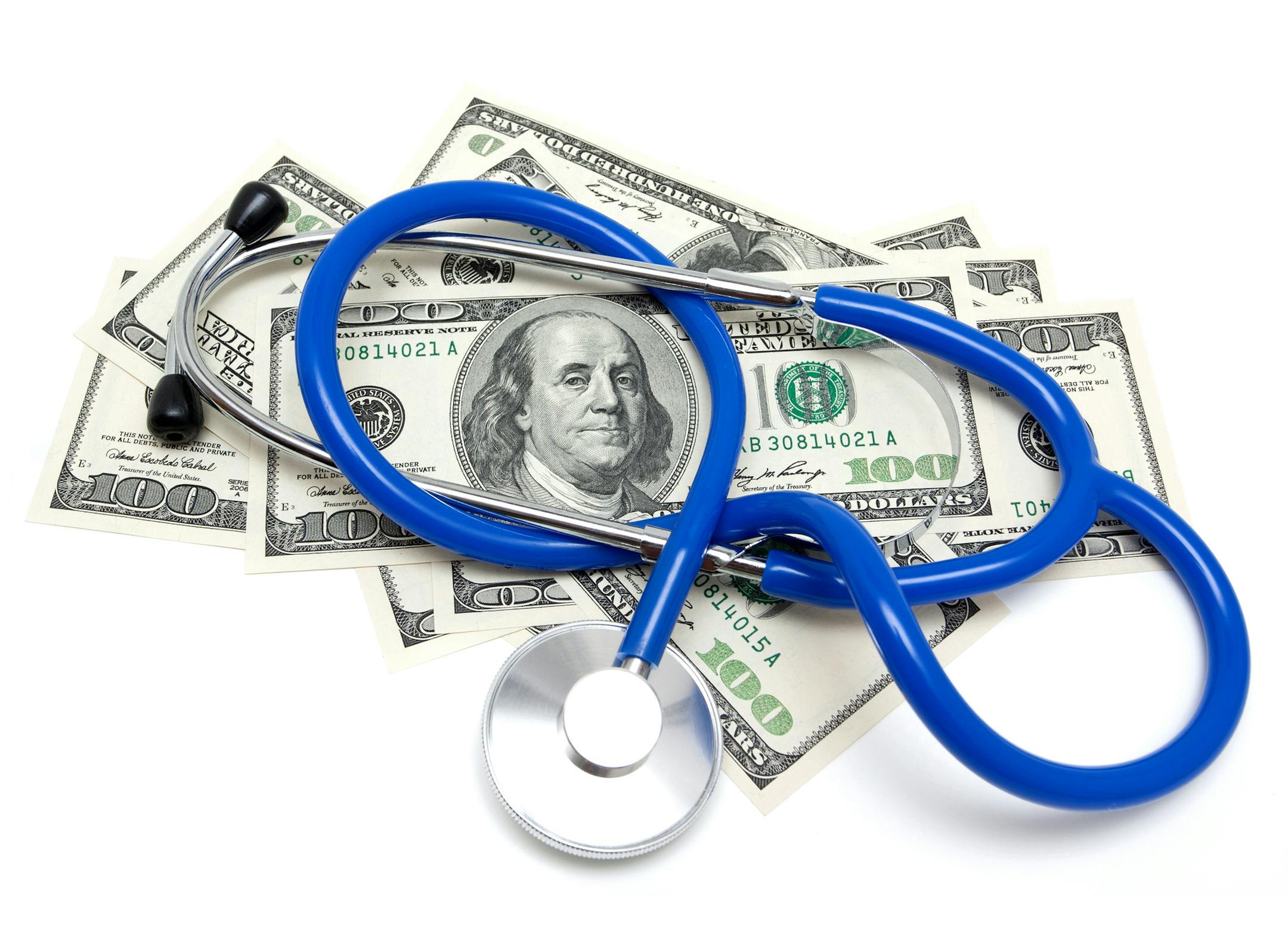 iStock
Stethoscope on US dollars isolated on white background.