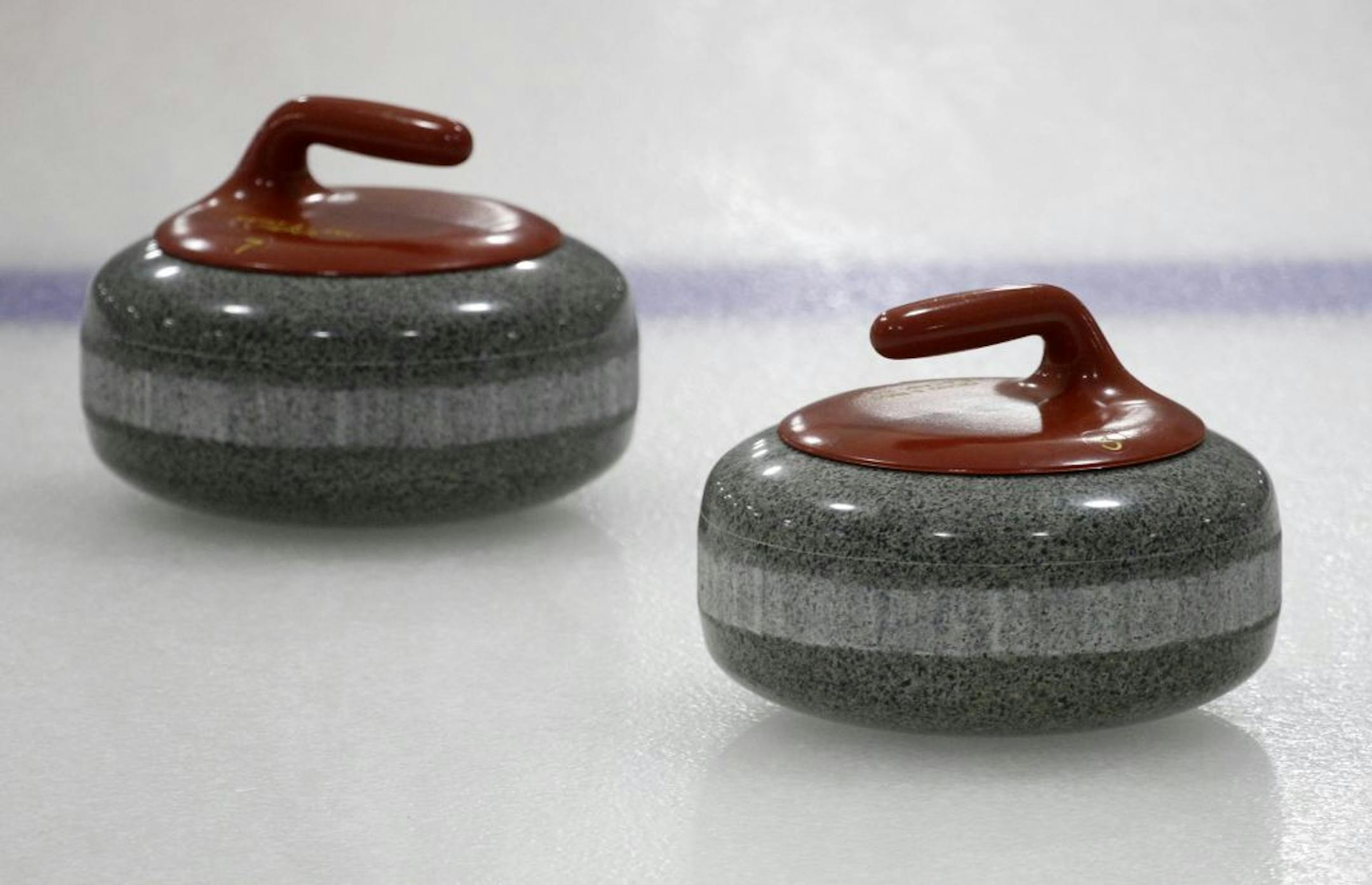 The stones. Olympic curler, Cassie Potter, practiced at the St Paul Curling last week over her lunch hour, she'll be competing at the world championship event, march 17-25 [ TOM WALLACE • twallace@startribune.com _ Assignments # 20022413A_ March 6, 2011_ SLUG: body0312 _ EXTRA INFORMATION: she and her team finished 8th in the last Olympics and were 2nd in the world.