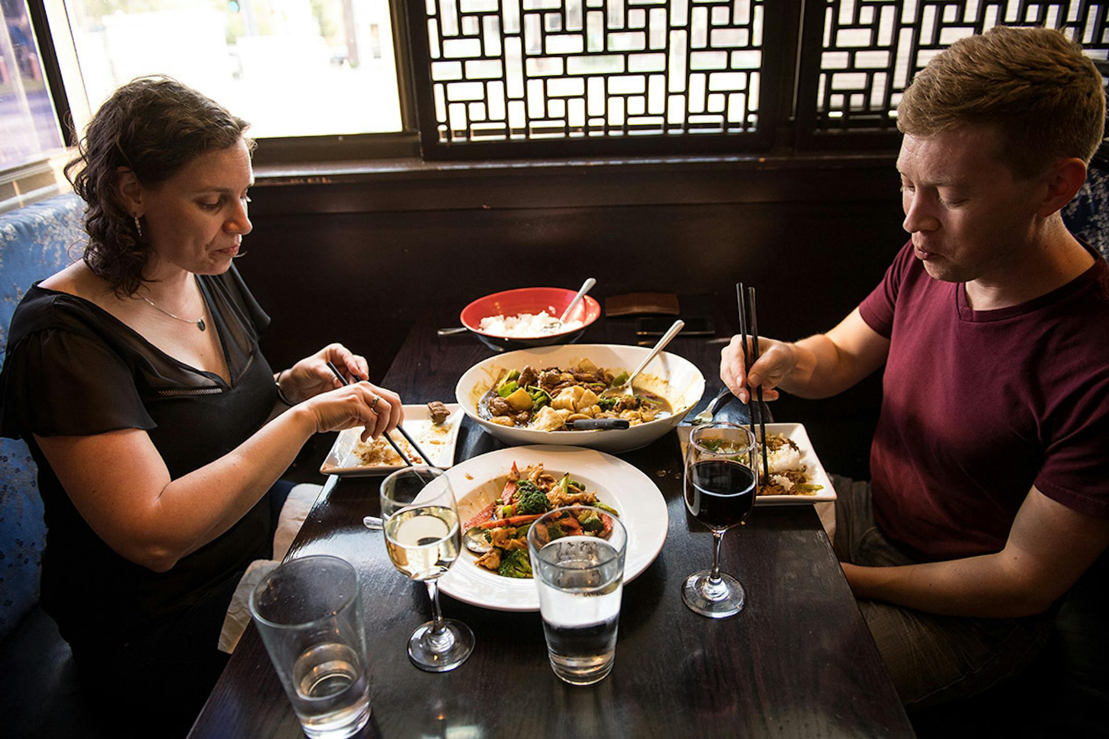 Jacque Ruen (cq) and Jason Hartfield (cq), of Minneapolis, ate the chicken and broccoli and big plate chicken special Wednesday night at The Tea House.