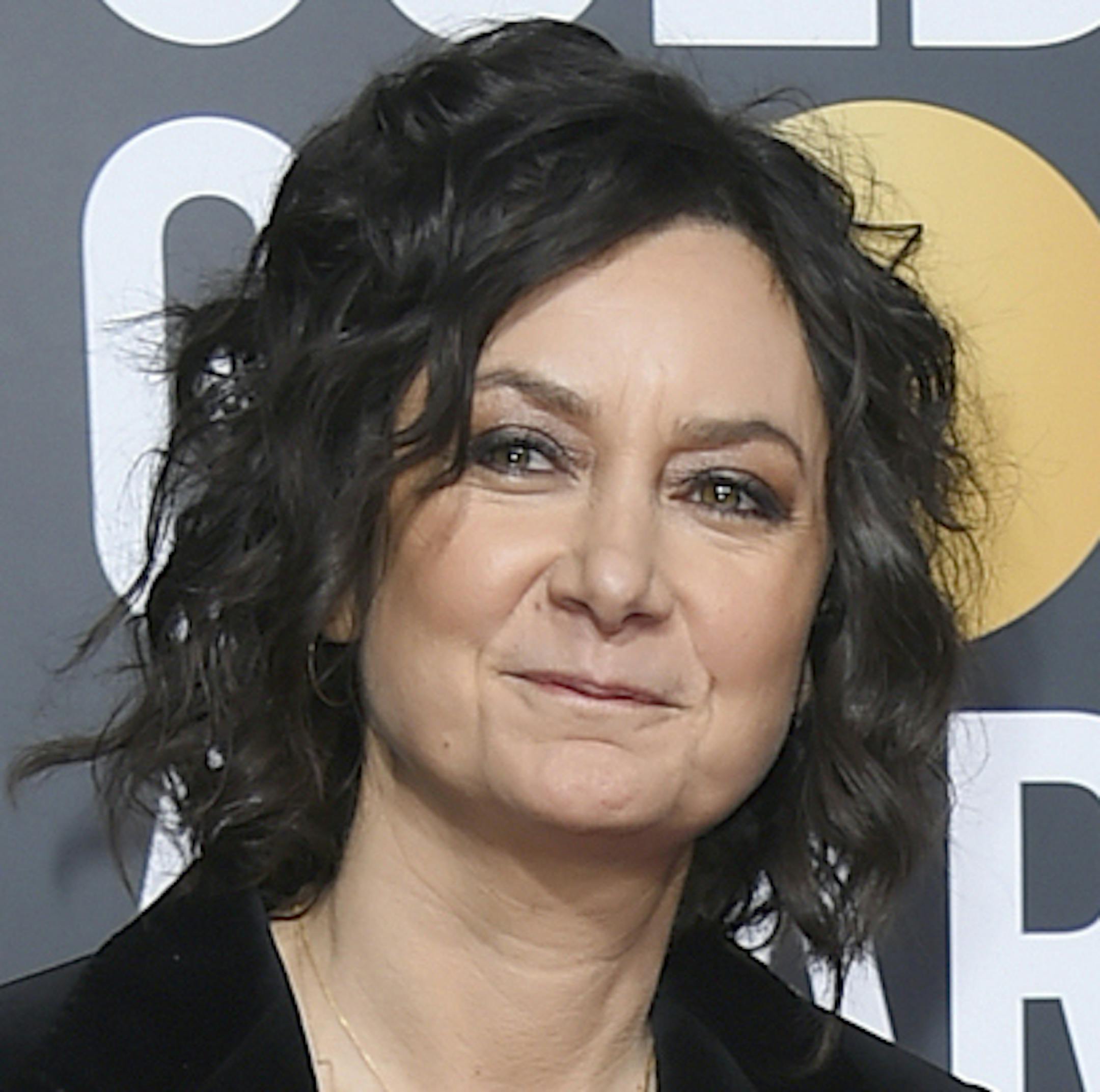 FILE - In this Jan. 6, 2019, file photo, Sara Gilbert, left, and Linda Perry arrive at the 76th annual Golden Globe Awards at the Beverly Hilton Hotel in Beverly Hills, Calif. Gilbert filed for legal separation from her wife of five years, singer and songwriter Perry on Friday, Dec. 27. (Photo by Jordan Strauss/Invision/AP, File)