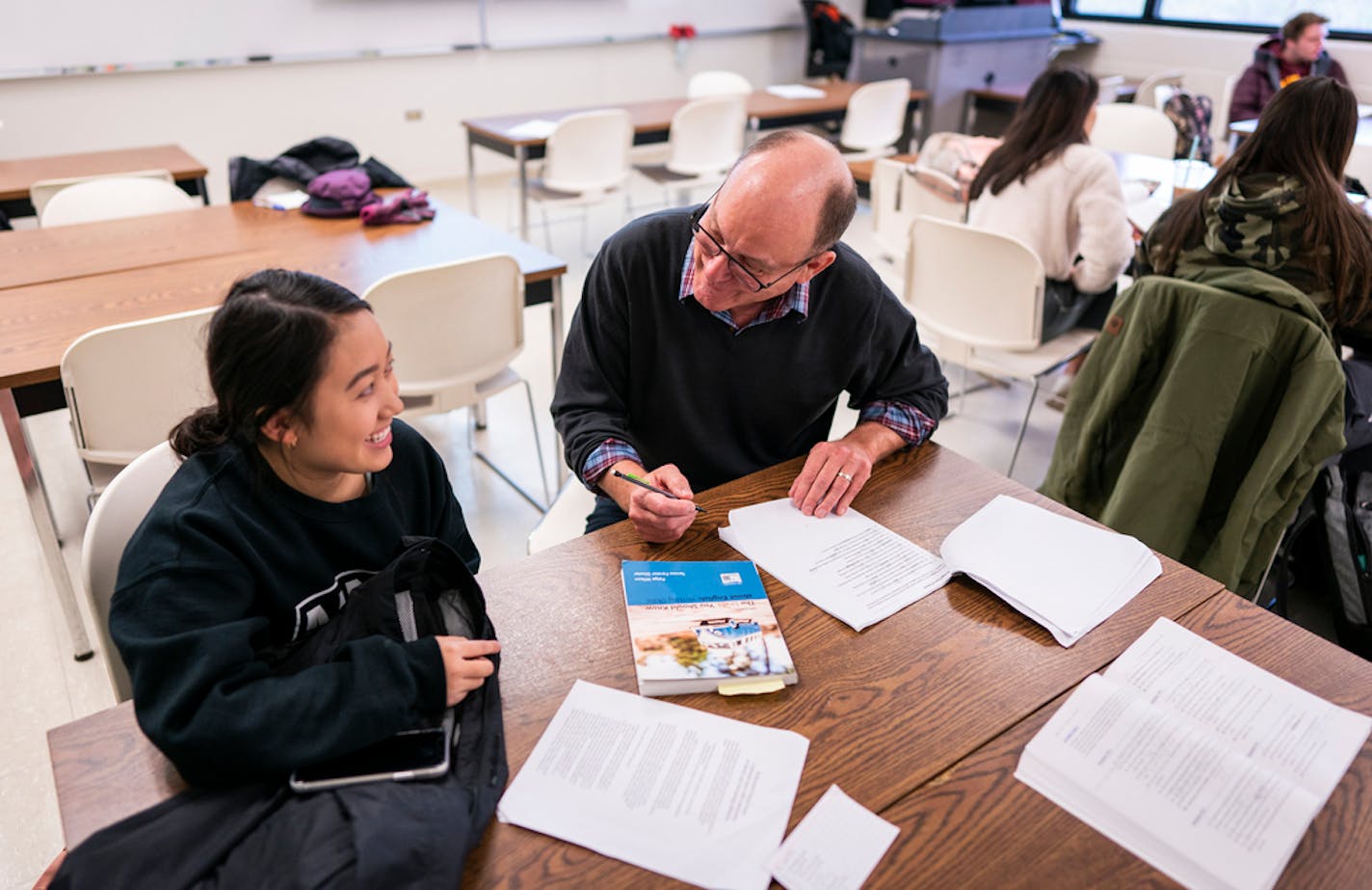 Teacher Christopher Weyandt, right, worked with student Grace Moua during English class at Century College in White Bear Lake on Wednesday, November 6, 2019.