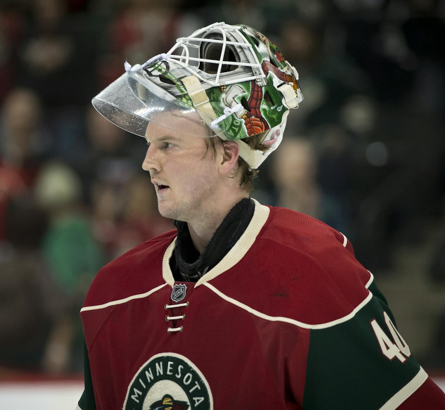 Minnesota Wild goalie Devan Dubnyk (40) skates off the ice after the Wild's 4-2 victory over Calgary. ] (Aaron Lavinsky | StarTribune) The Minnesota Wild play the Calgary Flames on Friday, March 27, 2015 at Xcel Energy Center in St. Paul.