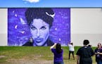 Prince fans gathered at the Prince mural on the side of the Chanhassen Cinema on April 21, 2017, marking the first anniversary of Prince's death.