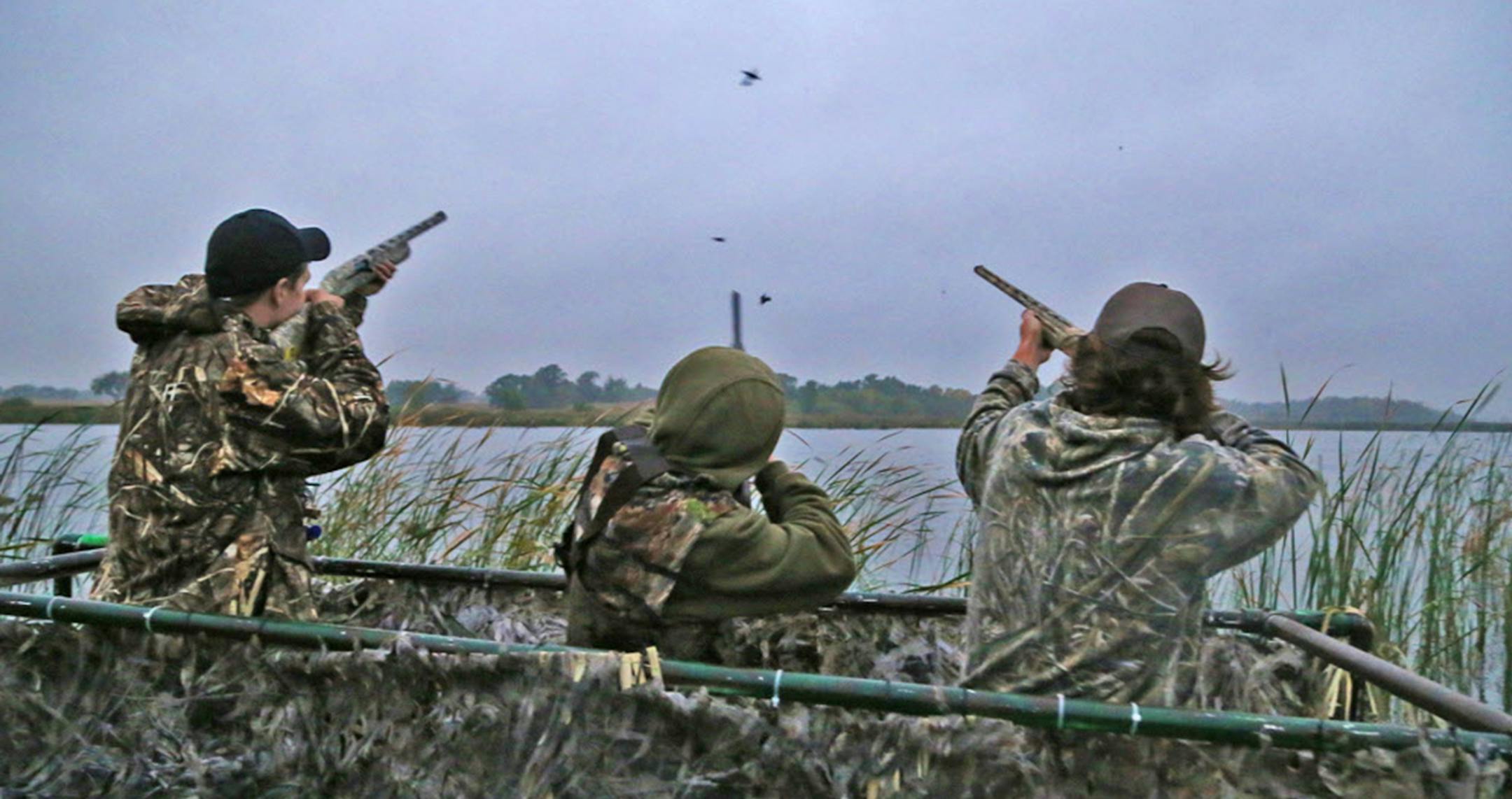 Trevor Unruh, left, Riley Mcalpine and Ryder Beckman drew down on a few blue-winged teal Saturday morning, opener of the 2016 Minnesota duck season. The three were hunting Pelican Lake near St. Michael. ORG XMIT: MIN1609240913310210
