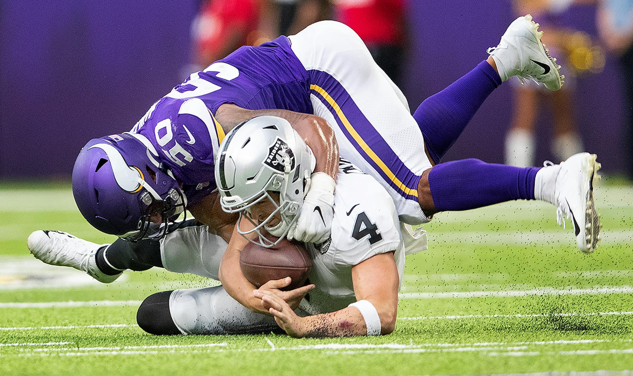 Minnesota Vikings' Eric Wilson (50) sacked Oakland Raiders quarterback Derek Carr in the fourth quarter.