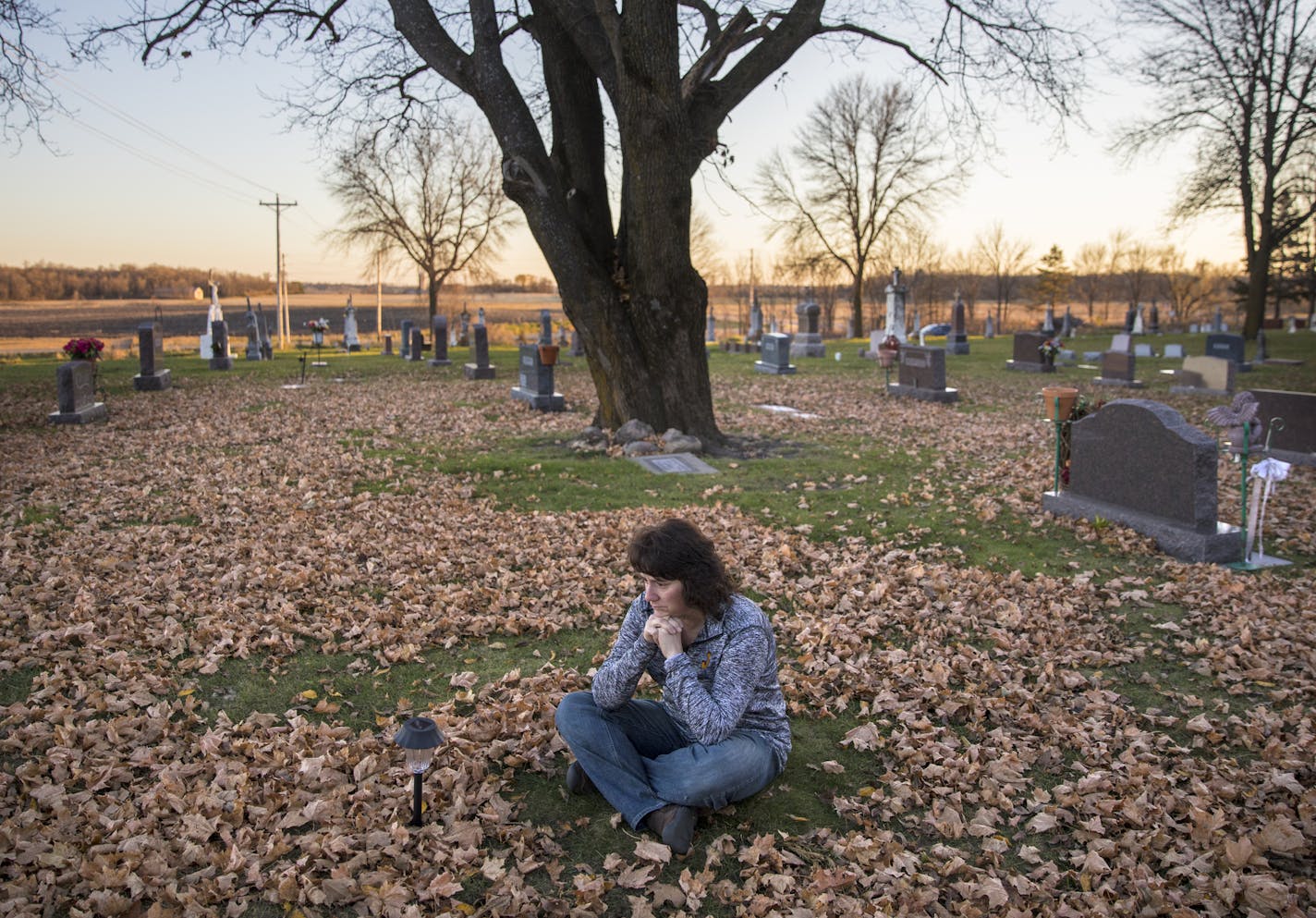 Renee Hentges visits the cemetery every day to commune with the husband and son she will never see again. Hundreds of farmers have come to her aid with helping hands and hearts.