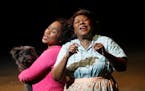 Paris Bennett's Dorothy and Greta Oglesby's Aunt Em share a moment before the storm in 'The Wiz,' a co-production between the Children's Theatre and P