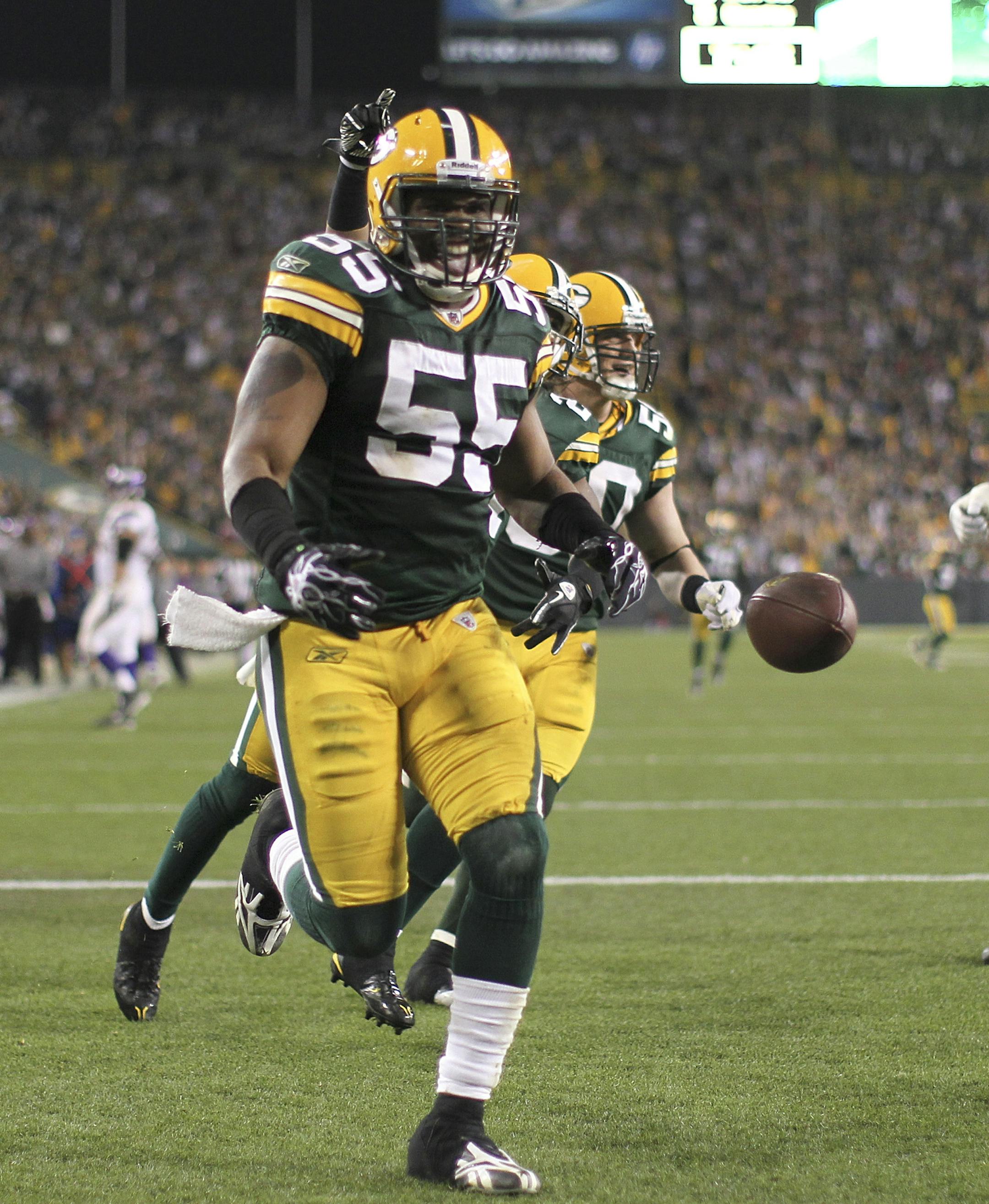 JEFF WHEELER • jeff.wheeler@startribune.com GREEN BAY - 10/24/10 - The Vikings lost a squeaker 28-24 to the Green Bay Packers at Lambeau Field in Green Bay Sunday night. IN THIS PHOTO: ] Green Bay's Desmond Bishop had one thing on his mind, a Lambeau Leap, after intercepting a Brett Favre pass in the third quarter and returning it 32 yards for a touchdown.