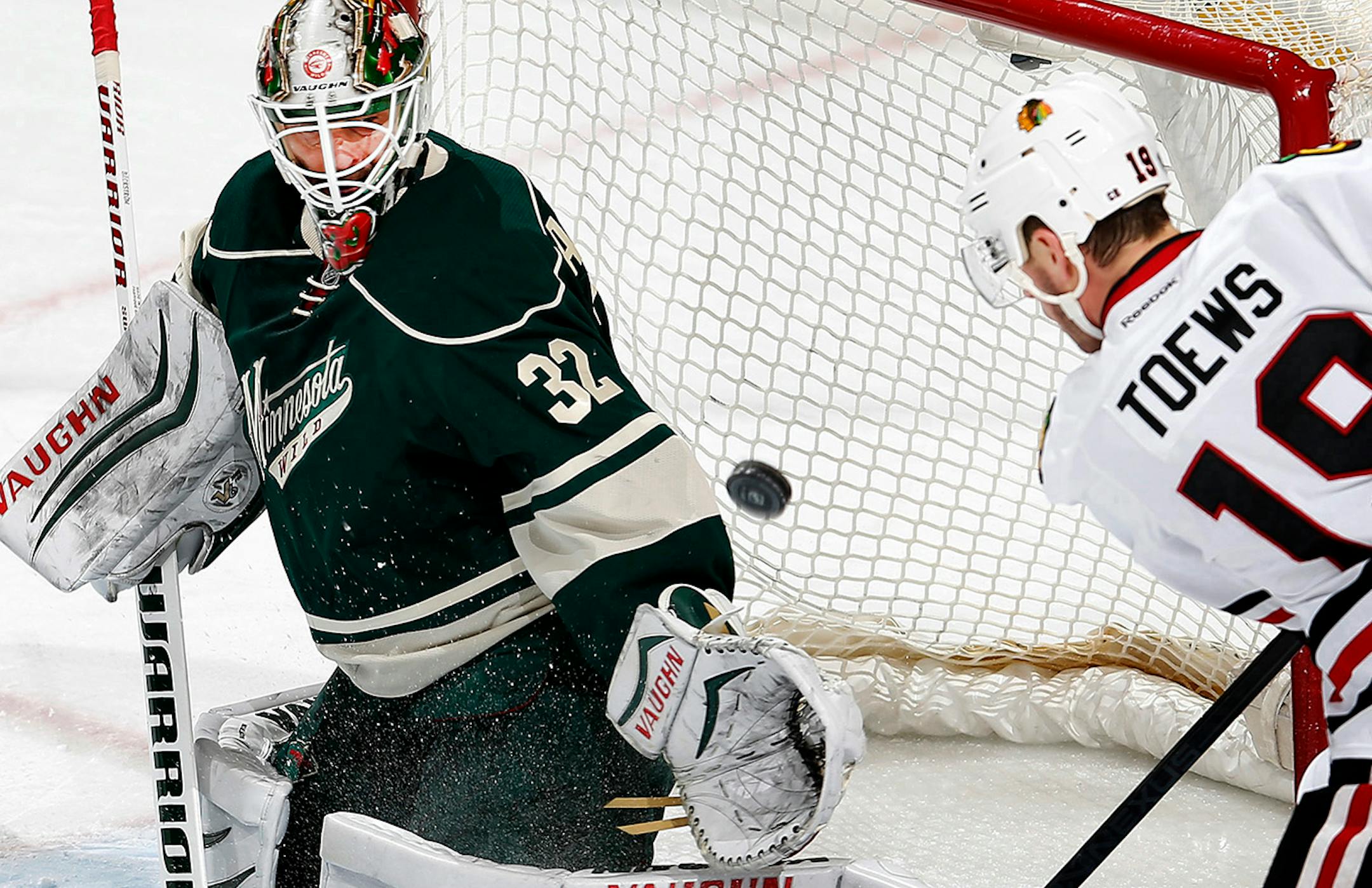 Minnesota Wild goalie Nicklas Backstrom (32) made a save against Jonathan Toews (19) in the first period. ] CARLOS GONZALEZ cgonzalez@startribune.com, January 8, 2015, St. Paul, Minn., Xcel Energy Center, NHL, Minnesota Wild vs. Chicago Blackhawks