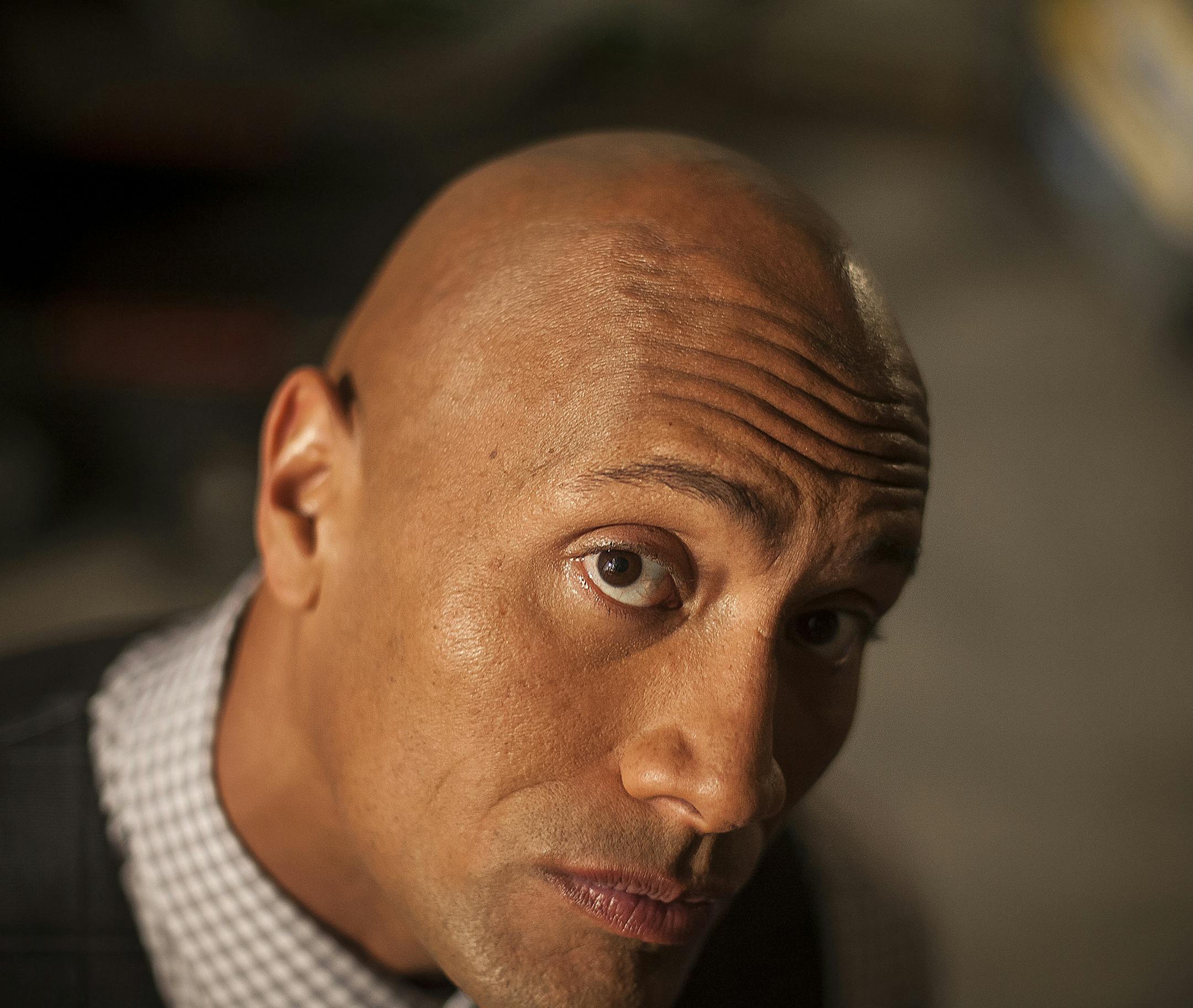 -- PHOTO MOVED IN ADVANCE AND NOT FOR USE - ONLINE OR IN PRINT - BEFORE MAY 24, 2015. -- Dwayne Johnson, who has recently been gliding on monster waves of attention, on the set of ìCentral Intelligenceî in Burlington, Mass., May 5, 2015. Unlike the sequels and franchises he has excelled in, Johnsonís next film, ìSan Andreas,î opening May 29, is his first top-lining role in a big-budget original story. (Ryan Conaty/The New York Times)