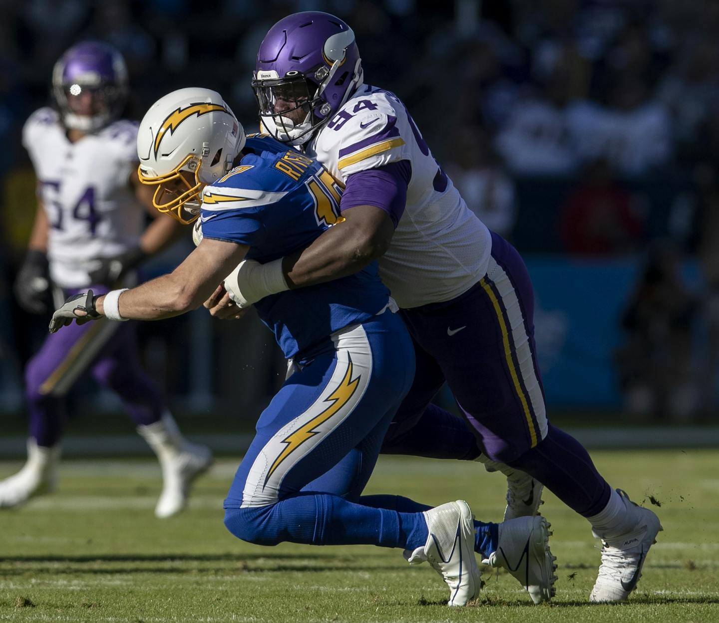 Minnesota Vikings' Jaleel Johnson (94) sacked Los Angeles Chargers quarterback Philip Rivers in the second quarter.