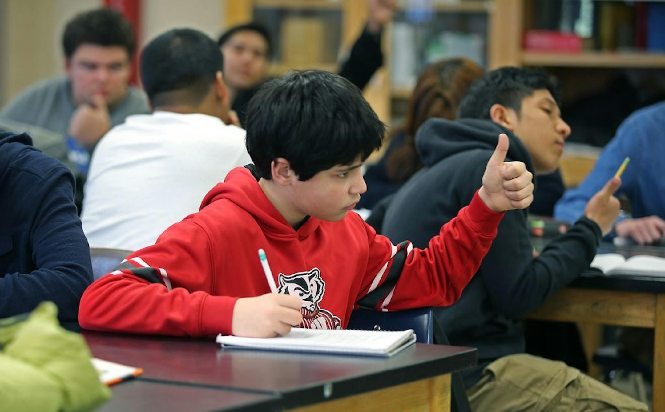 Washburn High School student Cole Keyes gave a thumbs up after answering a question in chemistry class on Feb. 24, 2015. Since 2009, Washburn's student population has doubled from 800 to more than 1,600.