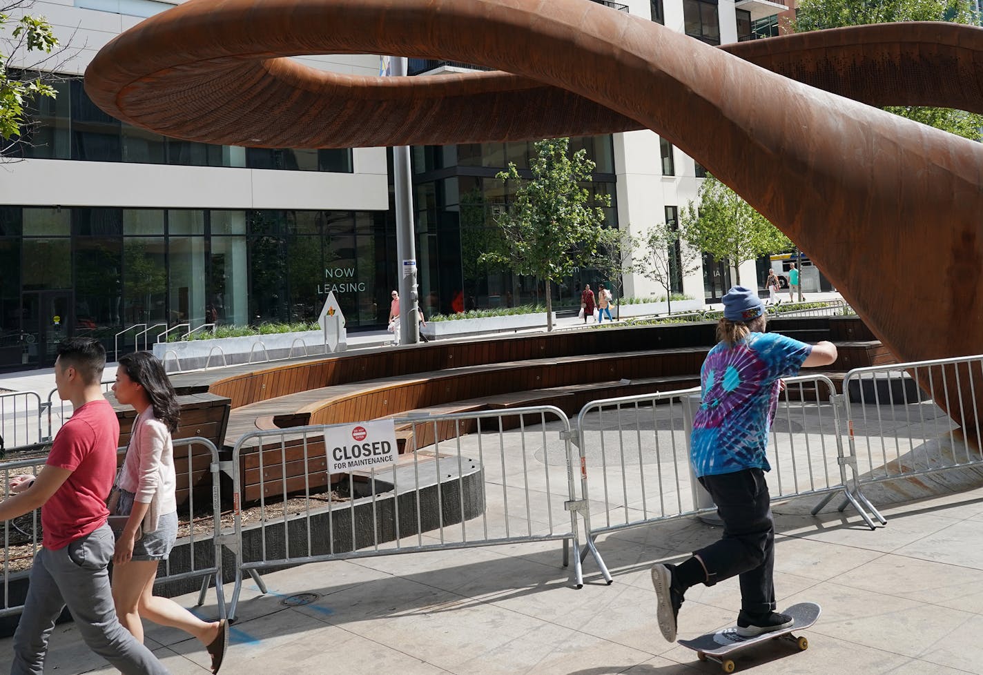 The 10-ton sculpture called 'Nibus' which rests outside the Hennepin County Central Library in downtown Minneapolis has been closed off by barricades for a second time this summer. ] Shari L. Gross &#xa5; shari.gross@startribune.com A large sculpture in downtown Minneapolis has been closed off by barricades for a second time this summer because it has become an encampment for the homeless. The10-ton sculpture, called Nimbus, sits outside the Minneapolis Central Library on Nicollet Mall.