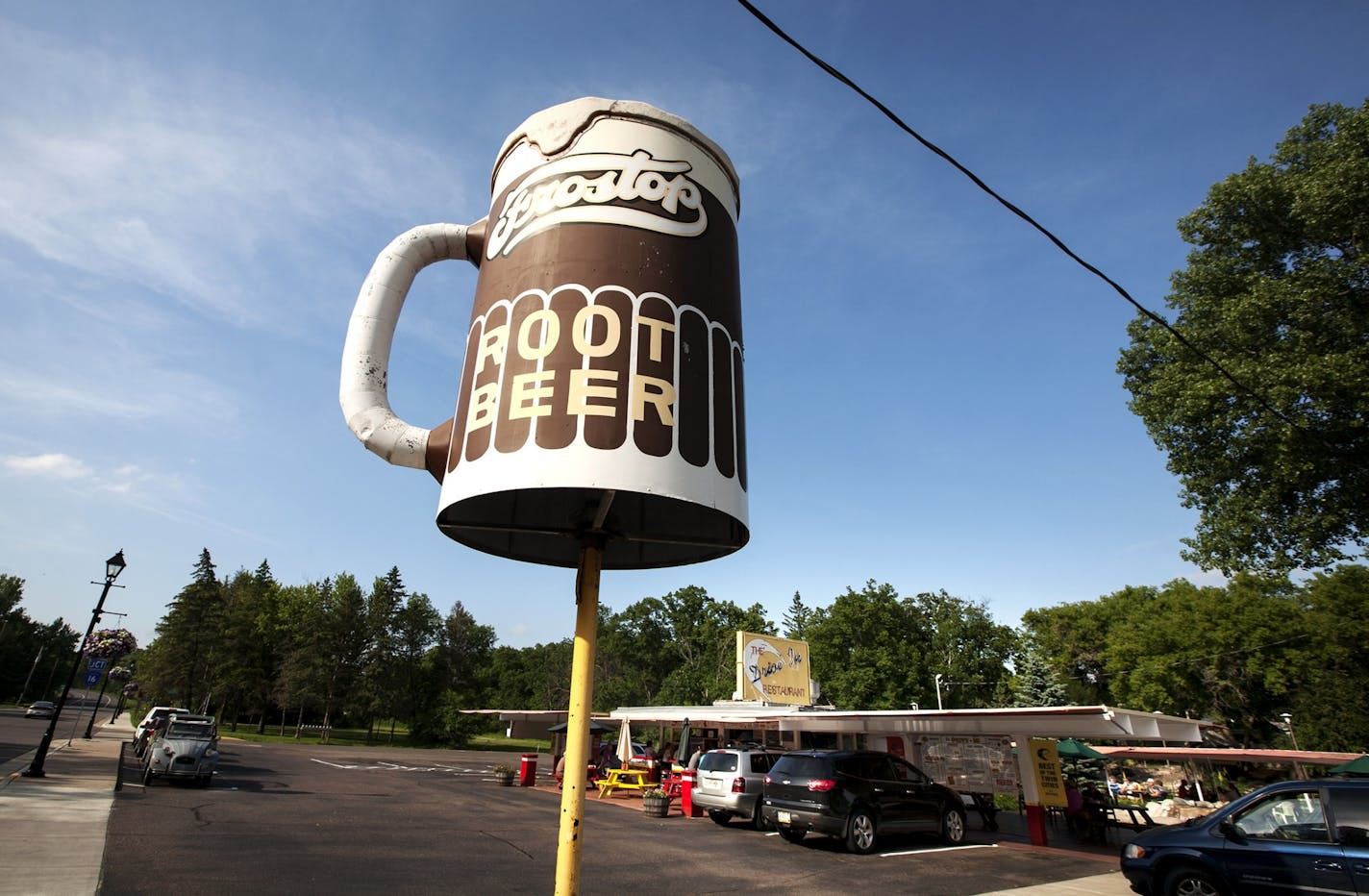 The large rotating root beer mug that spins slowly over The Drive-In in Taylors Falls was installed in 1963. Photo taken June 26, 2014.